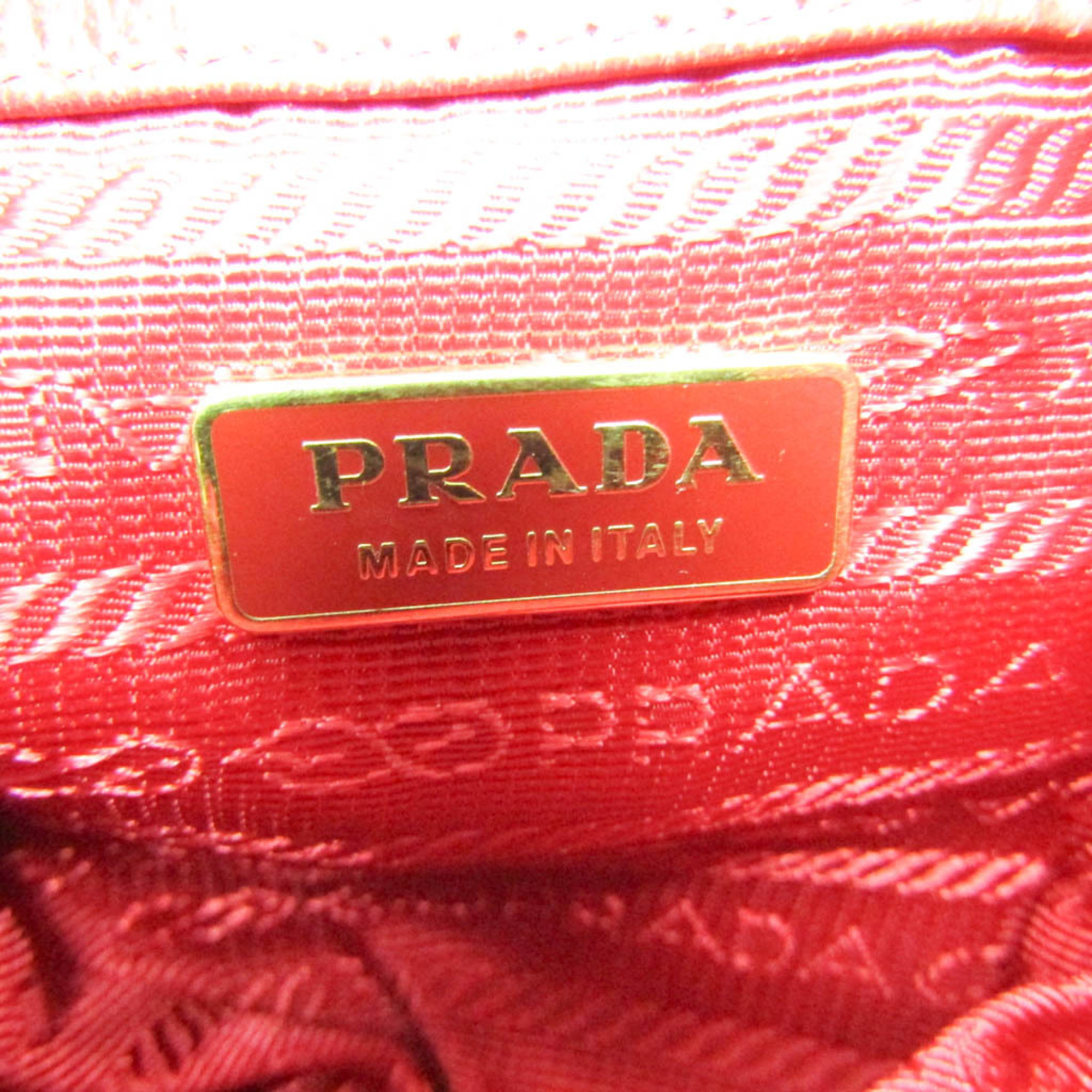 プラダ(Prada) 巾着型 ミニショルダーポーチ レディース レザー ショルダーバッグ レッド