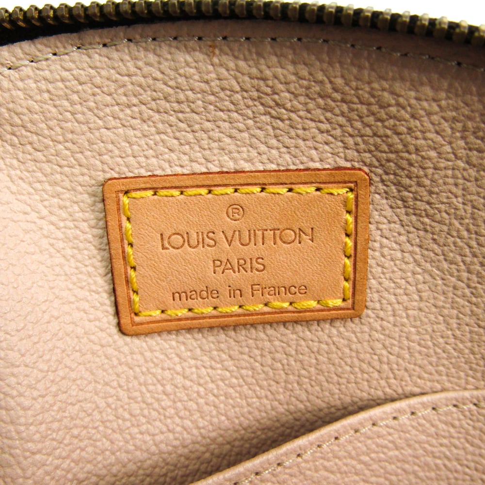 Lot 259 - Louis Vuitton Monogram Trousse Demi Ronde