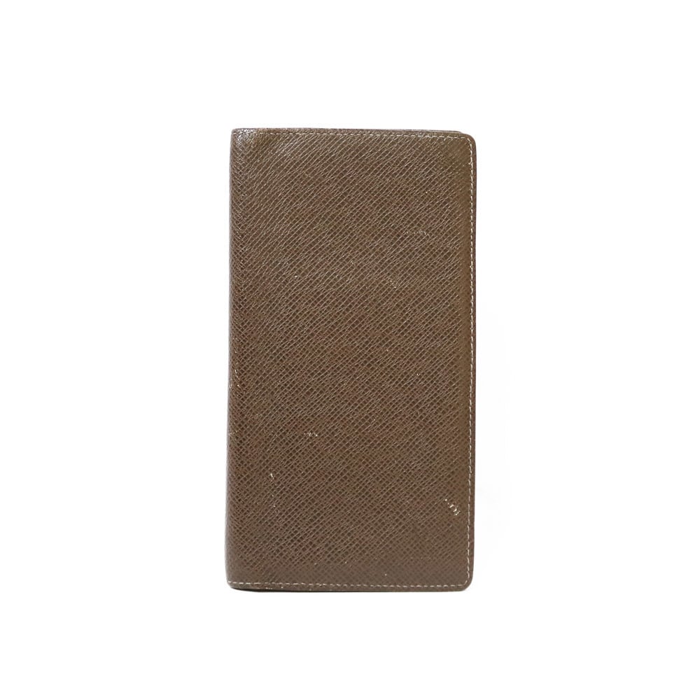 Louis Vuitton slender wallet carved from taurillon leather