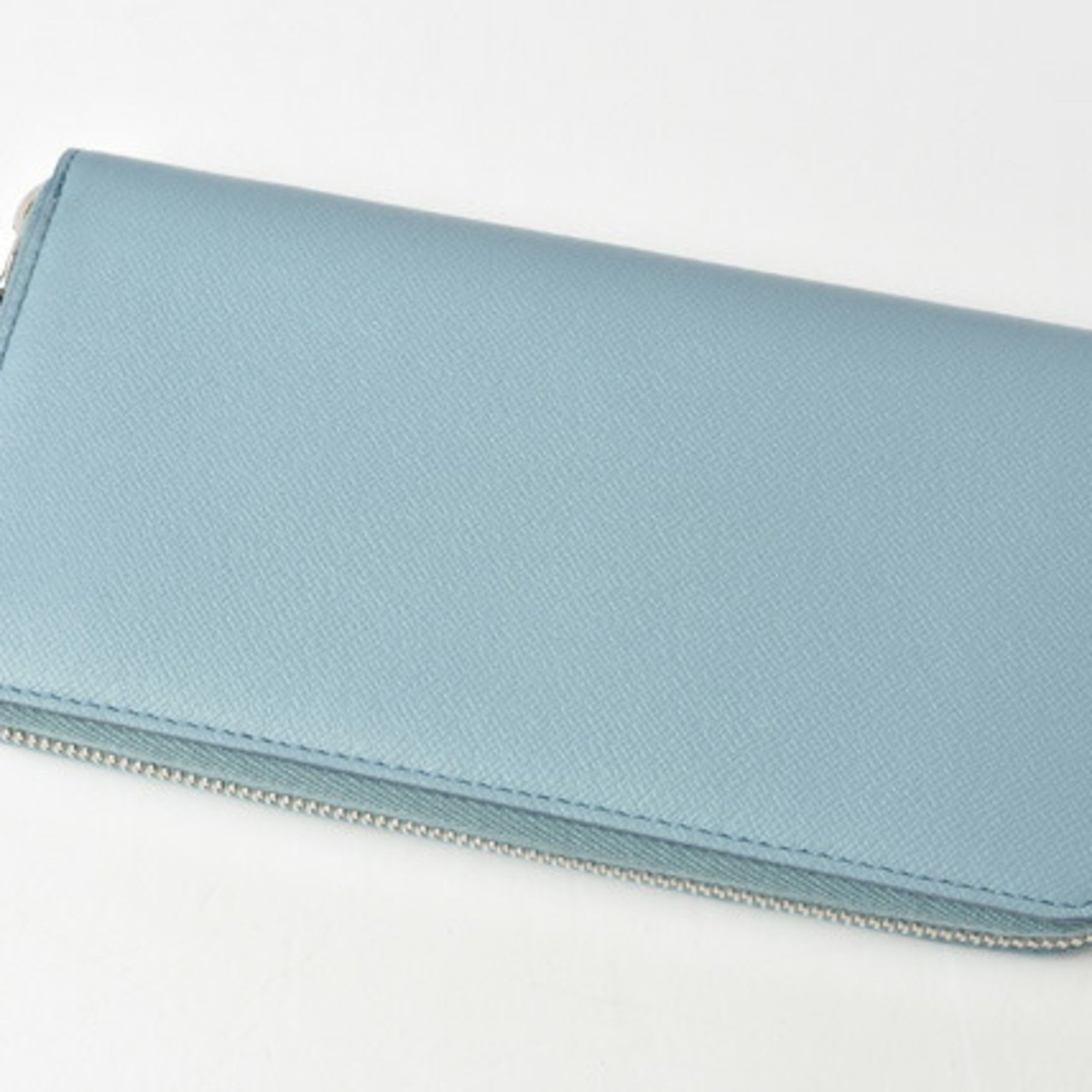 Tod's wallet TOD'S long round type leather light blue