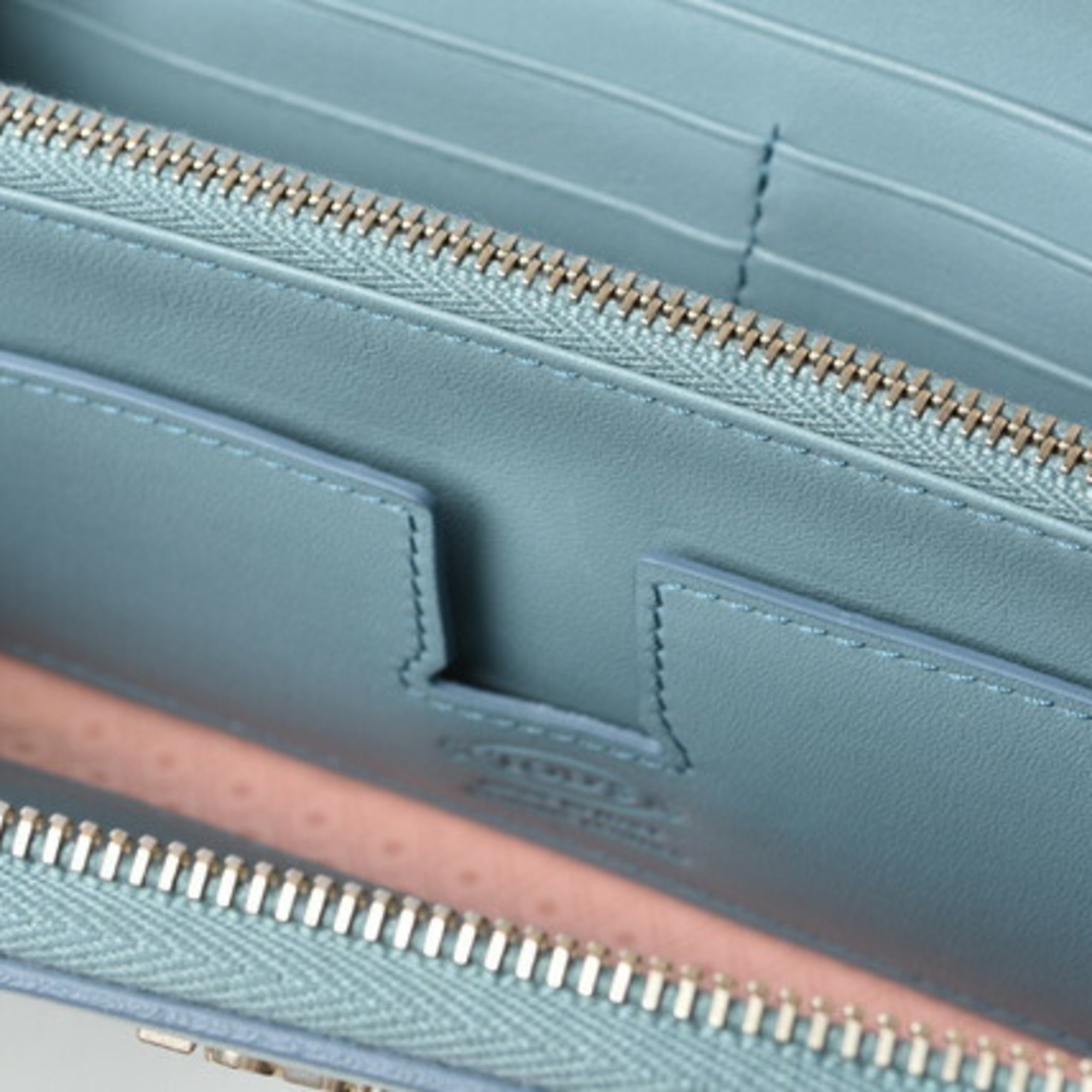 Tod's wallet TOD'S long round type leather light blue