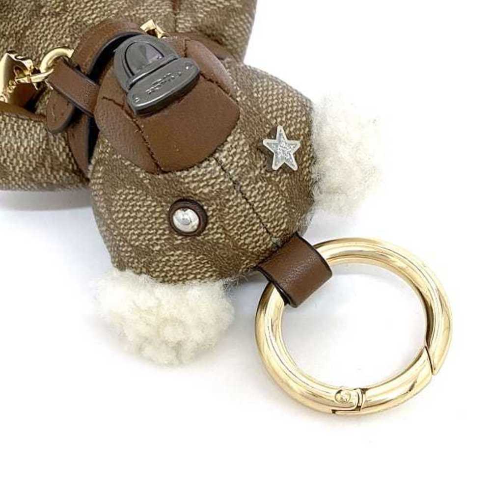 Coach bear charm beige brown white signature 77676 PVC leather COACH fur  bag key ring studs star holder teddy animal