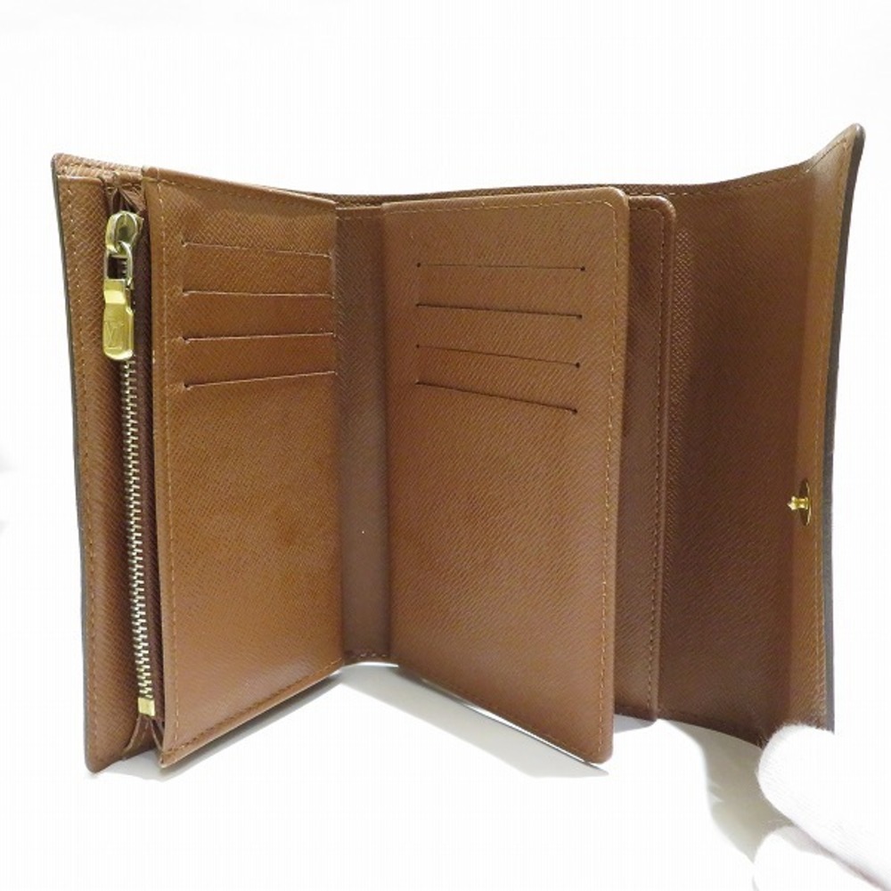 Alexandra leather wallet Louis Vuitton Brown in Leather - 32390063