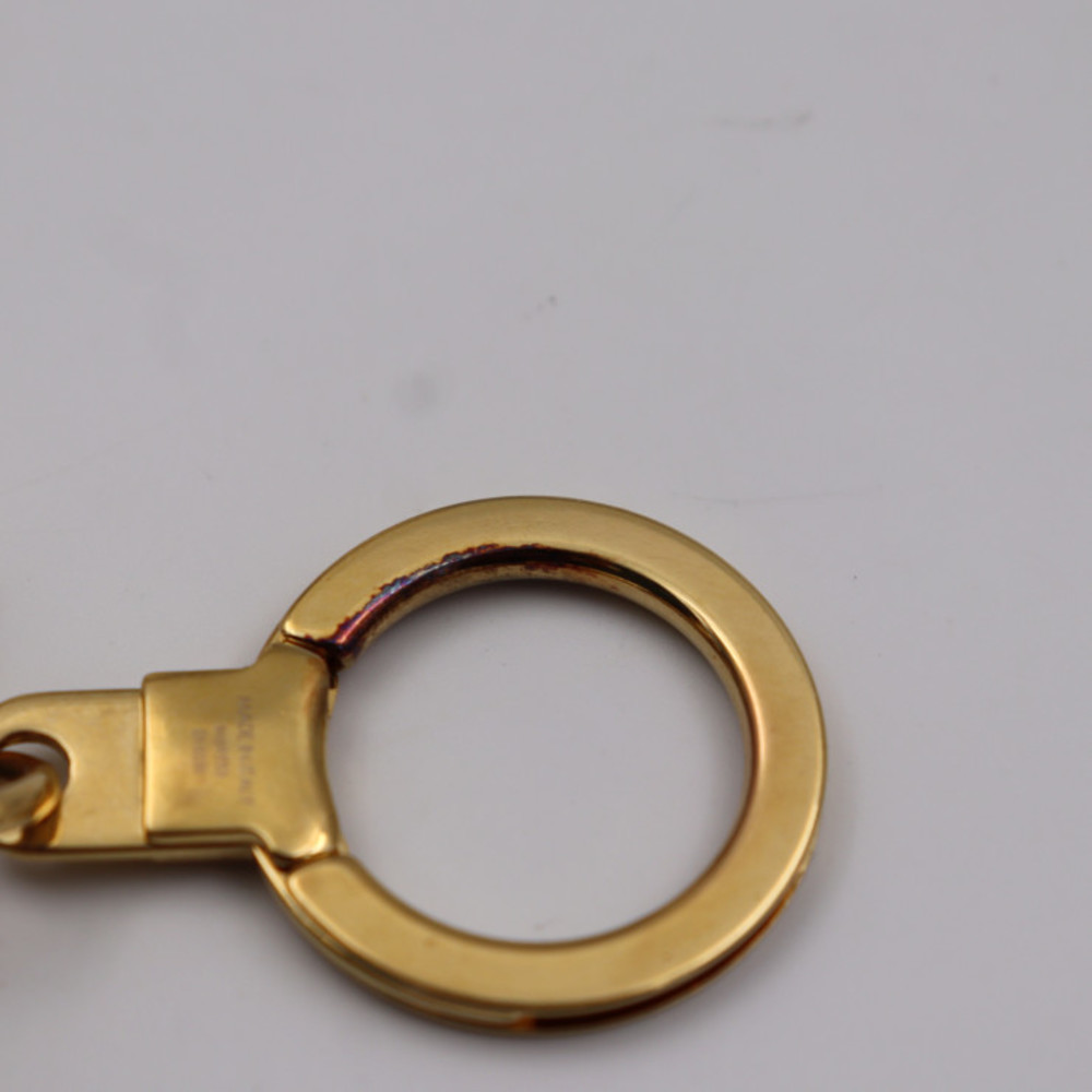 Buy LOUIS VUITTON key holder M69553 monogram reverse canvas gold