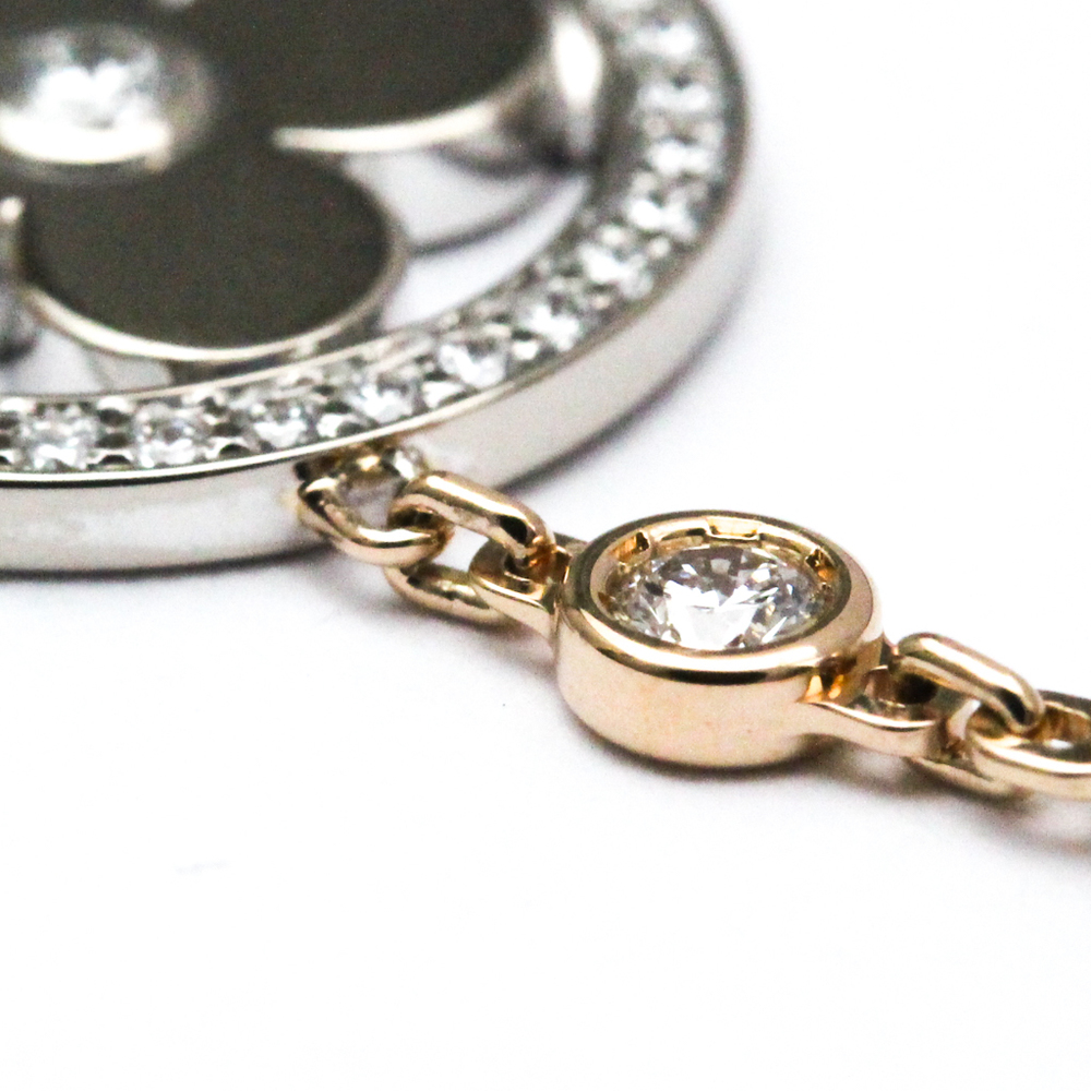 Vintage 18k gold Louis Vuitton pendant with diamonds