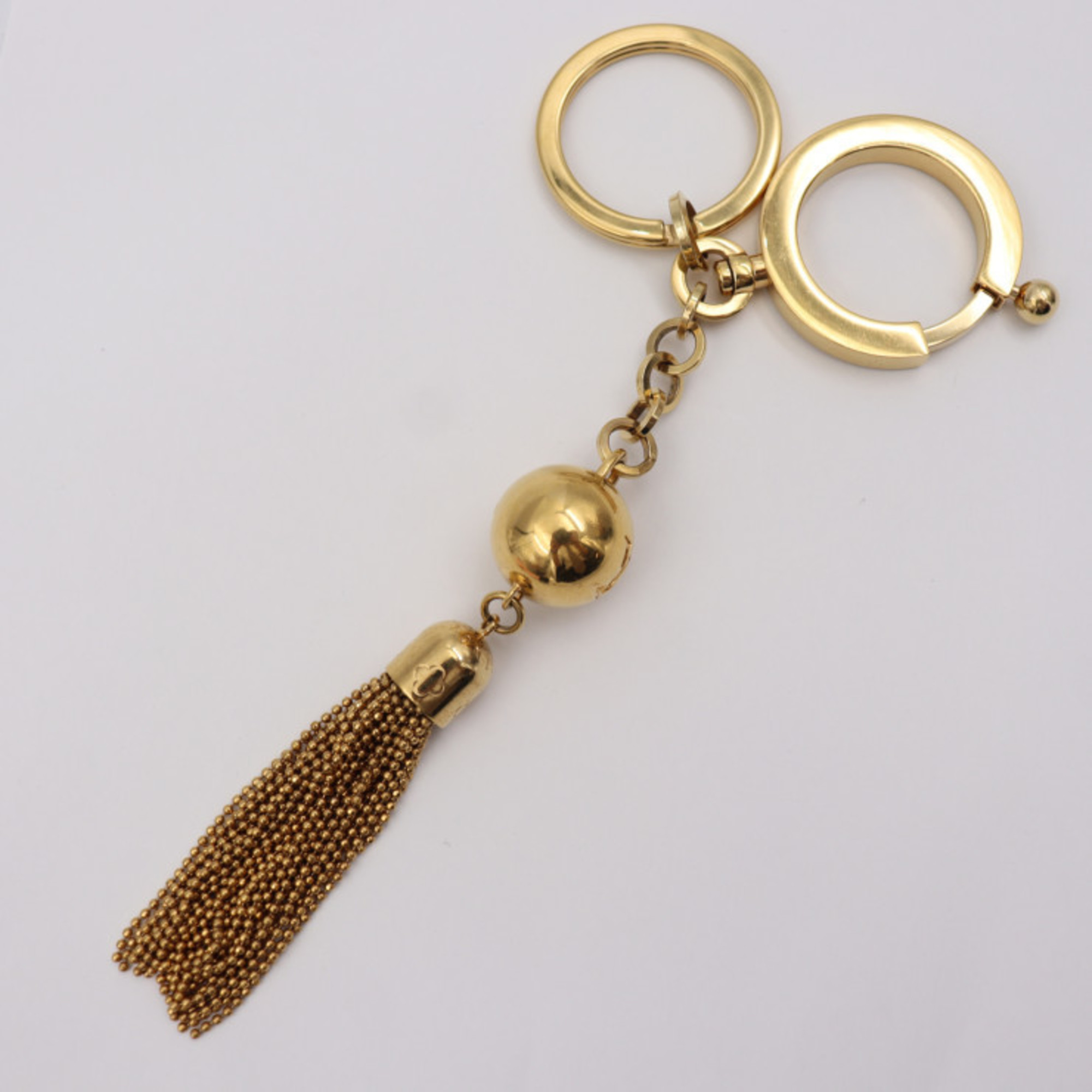 LOUIS VUITTON Louis Vuitton Portocre Swing Keychain M65997 Metal Gold Keyring Bag Charm