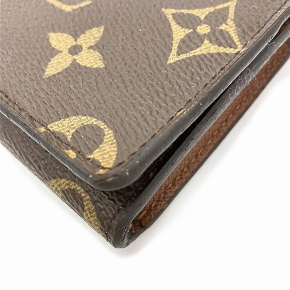 Louis Vuitton Monogram canvas business card holder. Brown Cloth