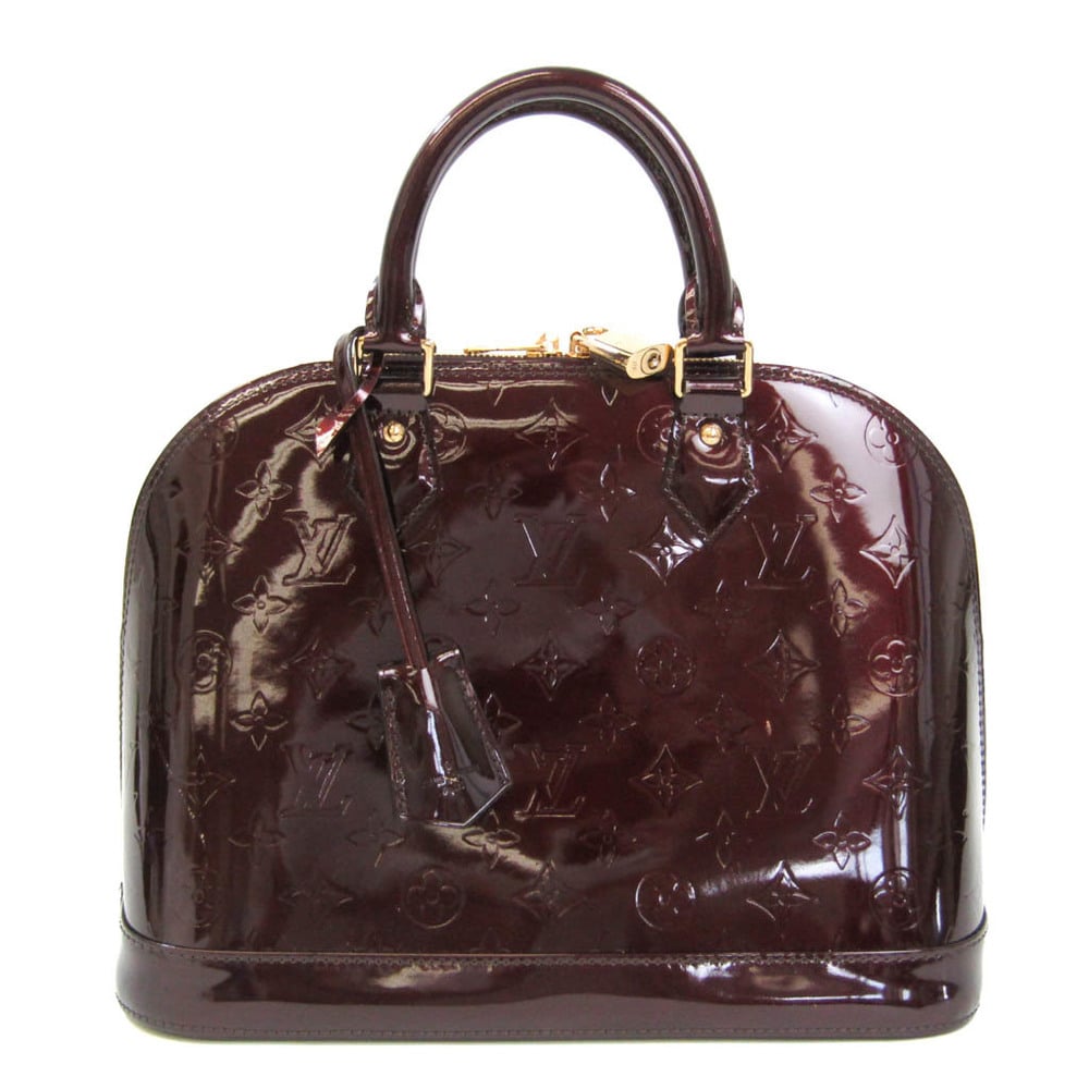 Vernis Alma BB monogrammed handbag.