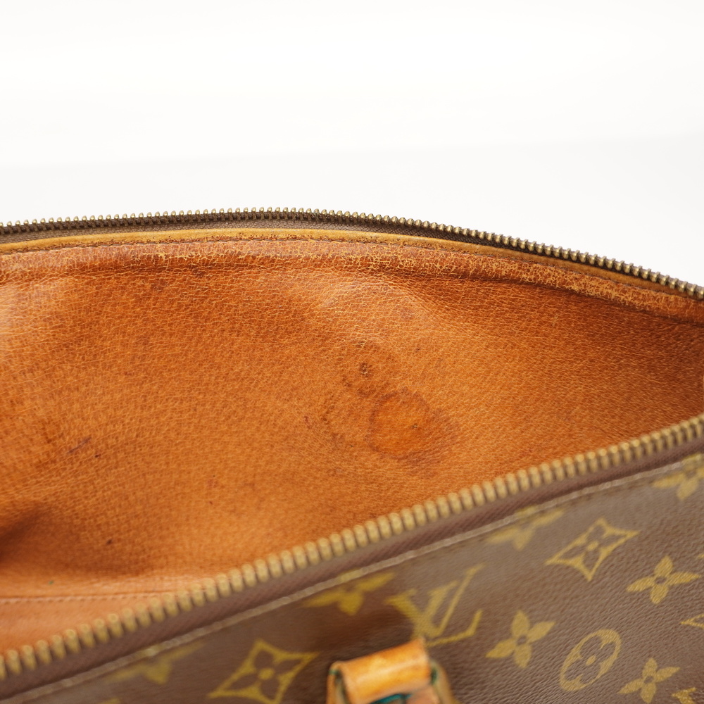 Louis Vuitton Monogram Sack Triangle Handbag – PETIT