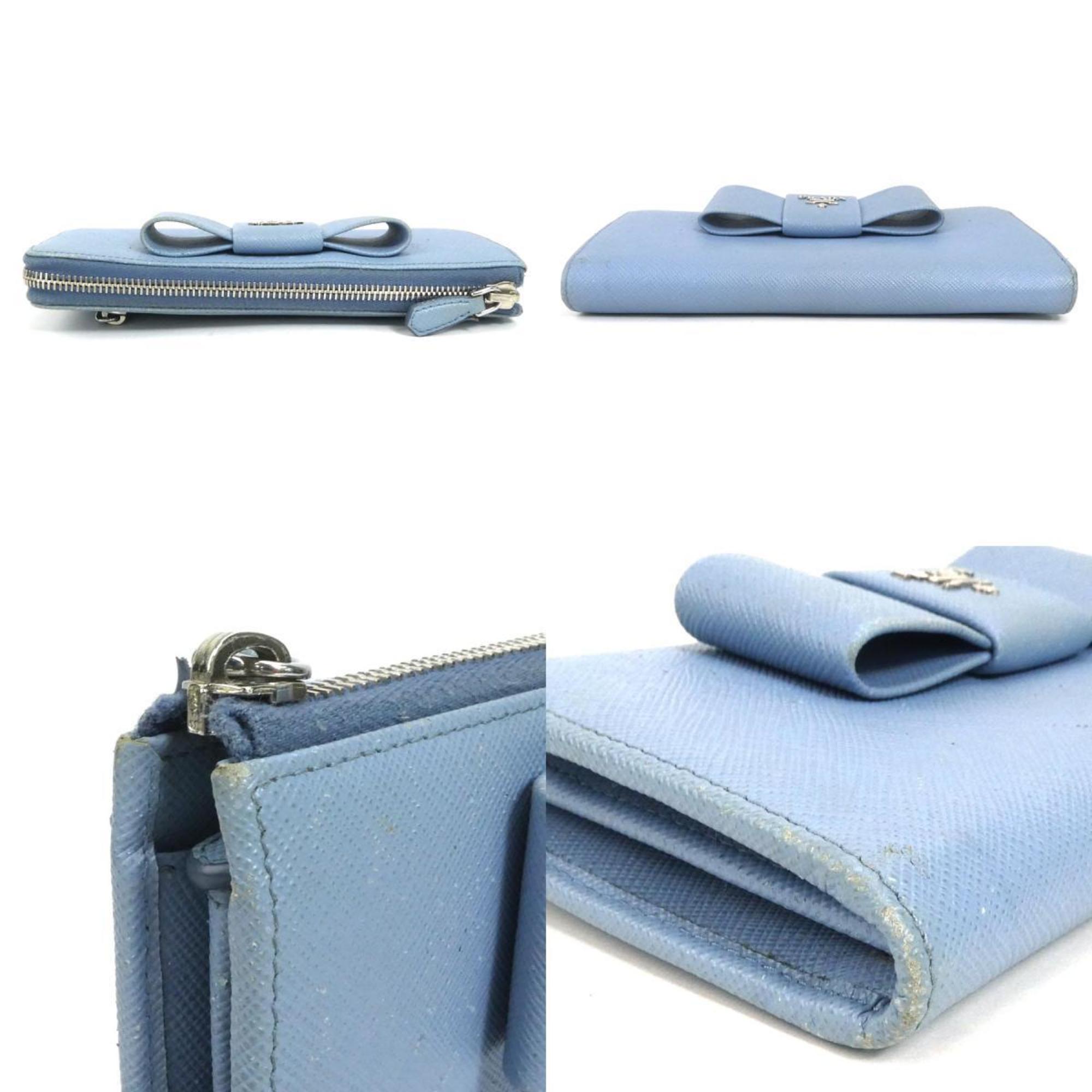PRADA L-shaped zipper long wallet logo ribbon leather light blue silver ladies