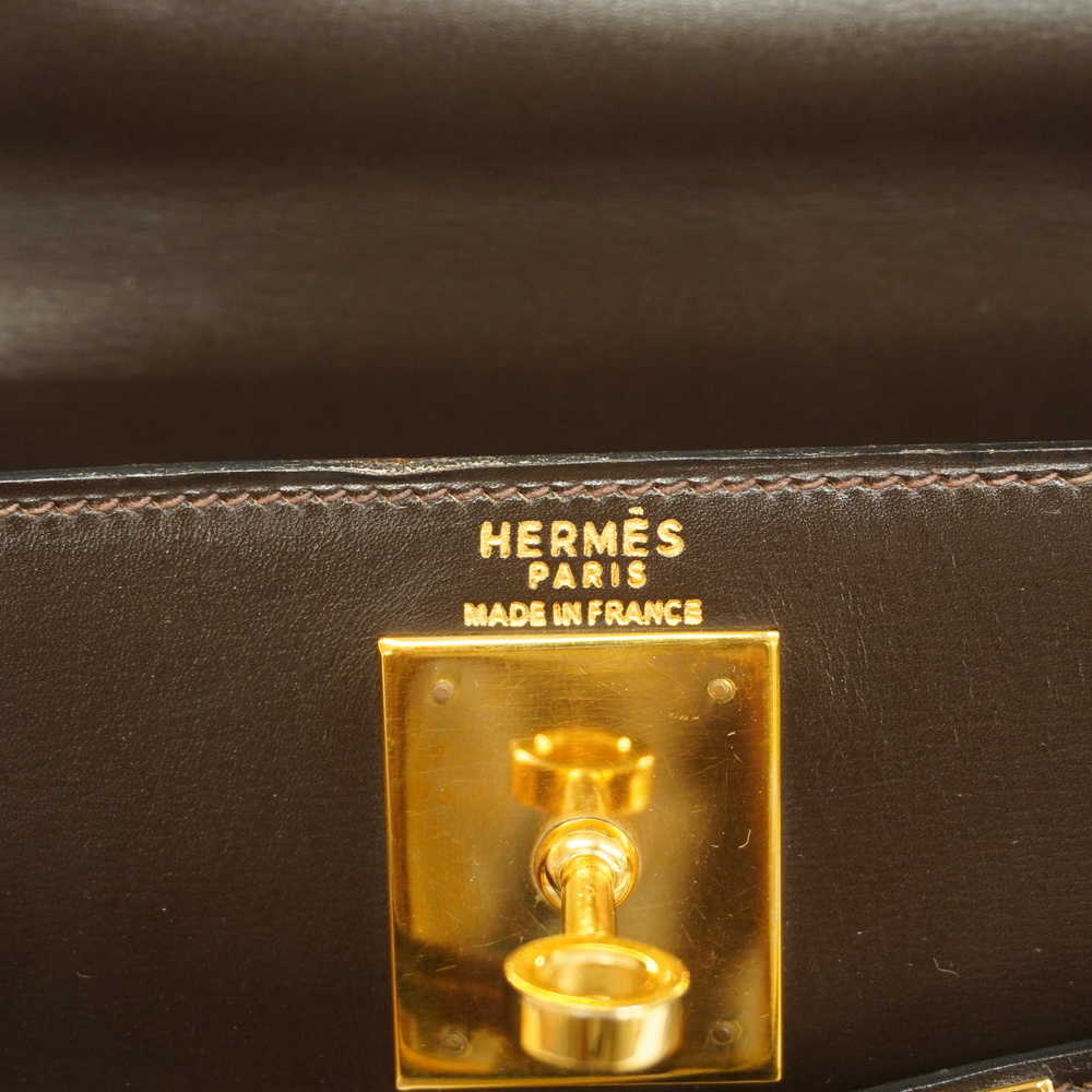 Lot 17 - An Hermès light tan box calf leather Kelly