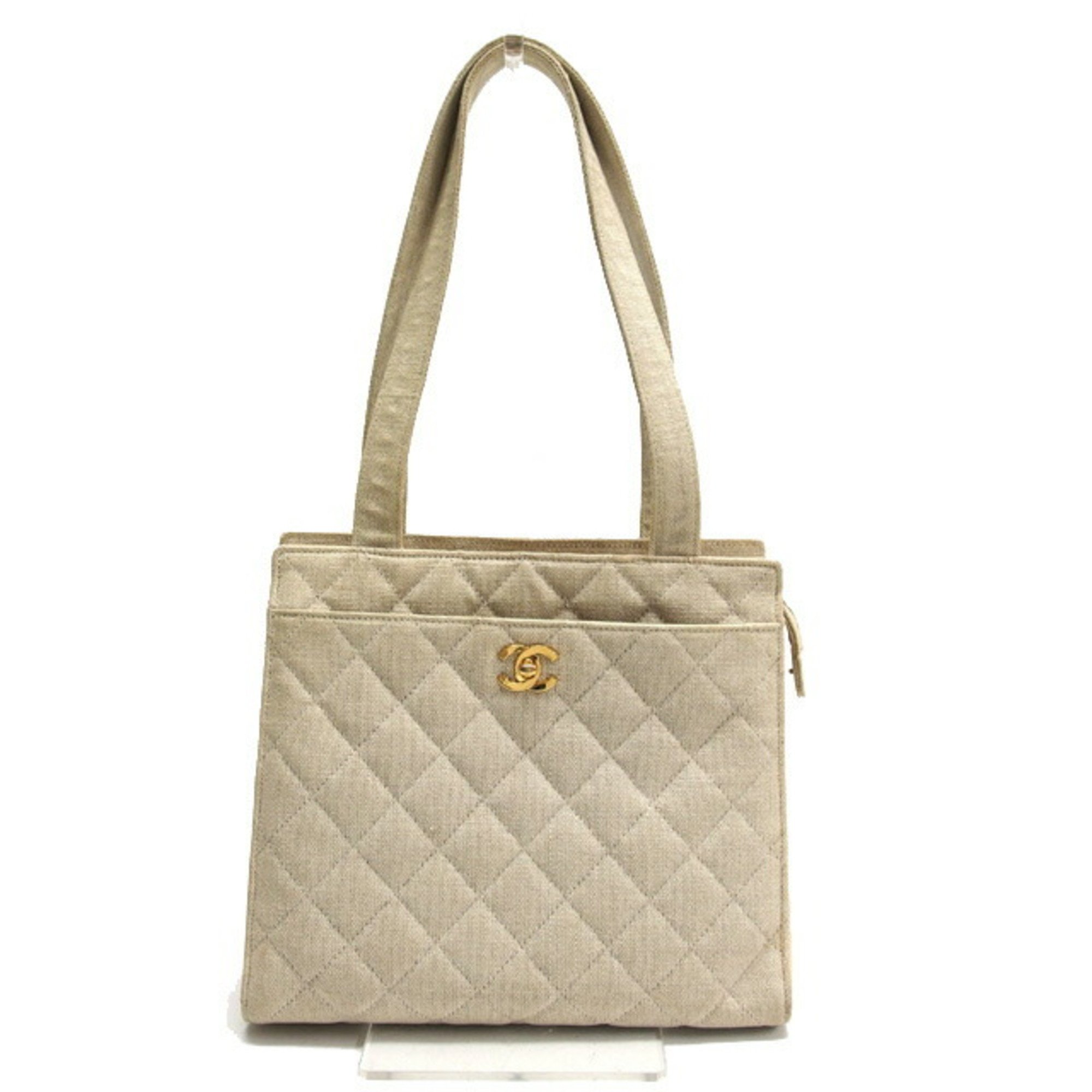 Matelasse canvas tote bag here mark ivory