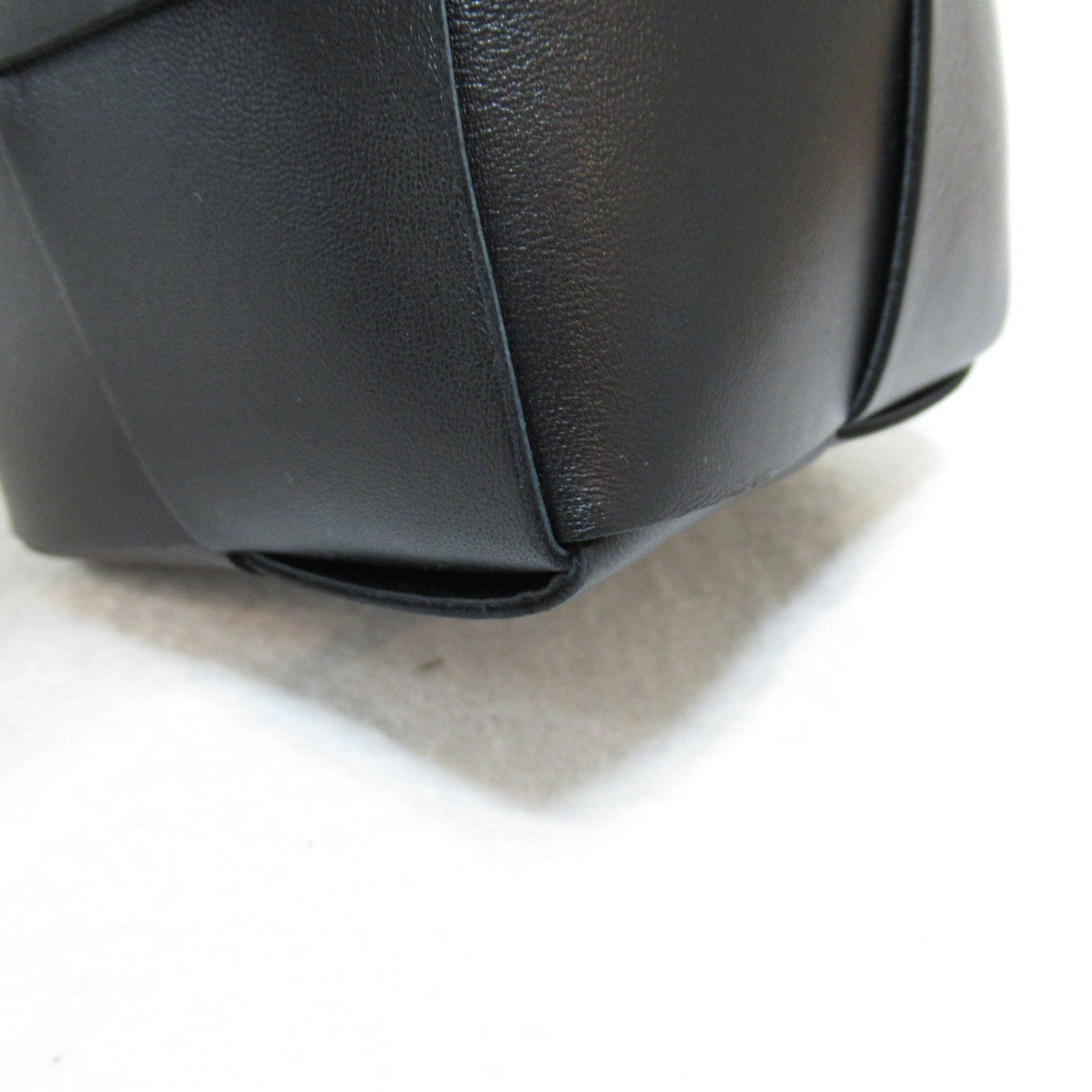 BOTTEGA VENETA Cassette mini cross-body bucket bag Black Calfskin (cowhide) 680217VCQC48425