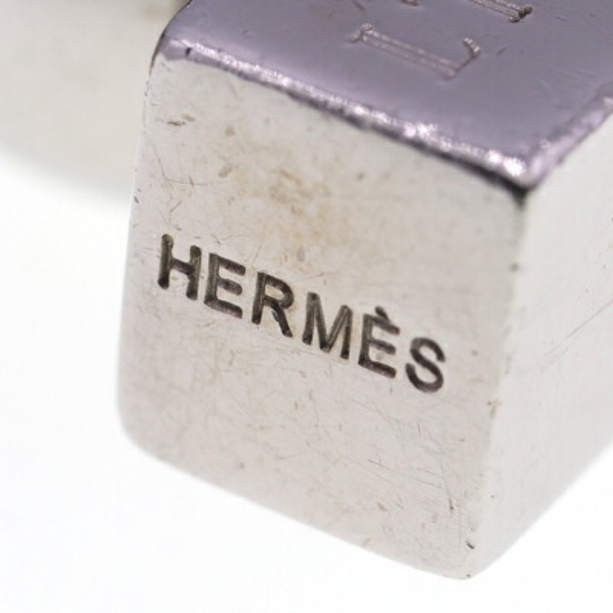 Hermes Cadena 2001 Limited In Search of the Unknown Beauty Earth Silver Metal Padlock Kadena L'HOMME PEUT EMBELLIR LA TERRE HERMES