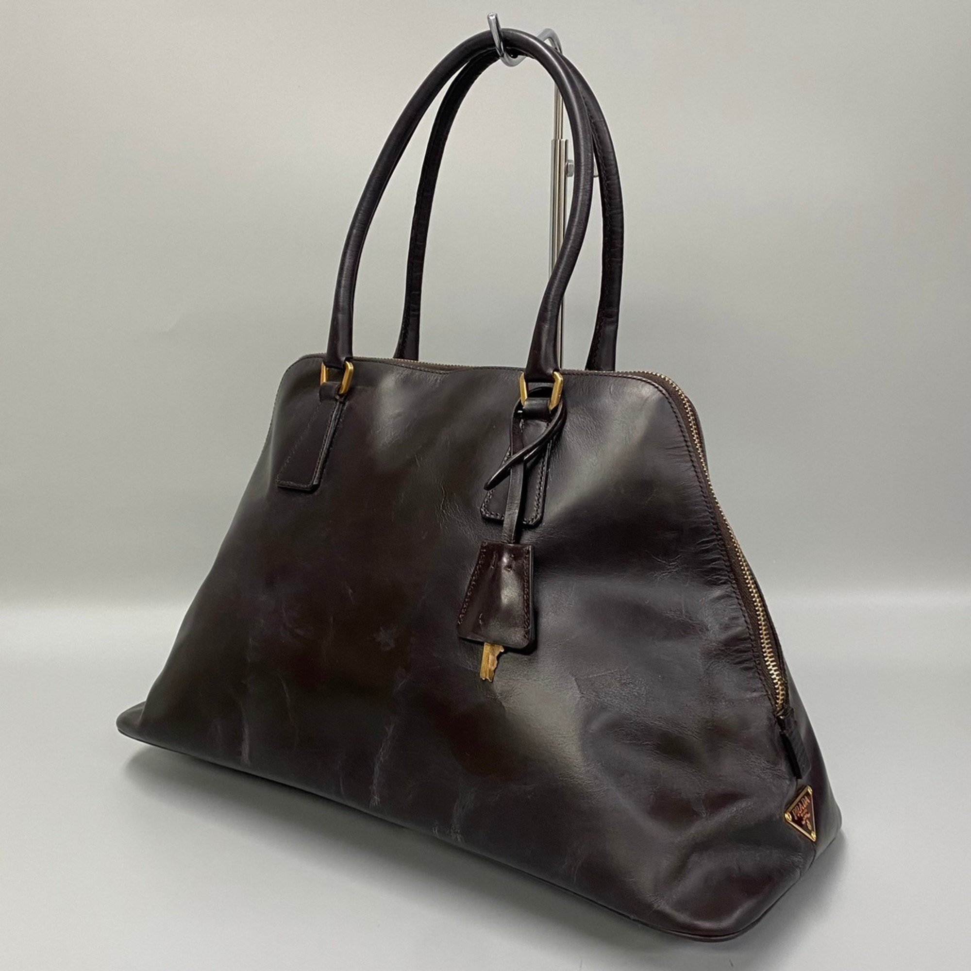 Prada triangle logo top leather tote