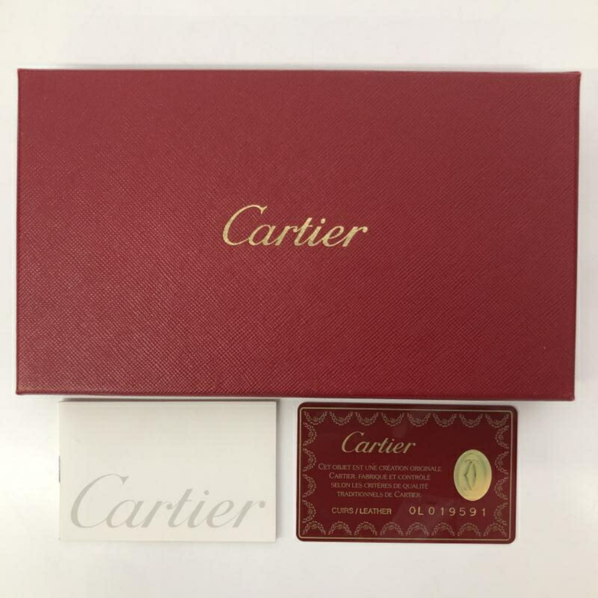Cartier long wallet cabochon leather black