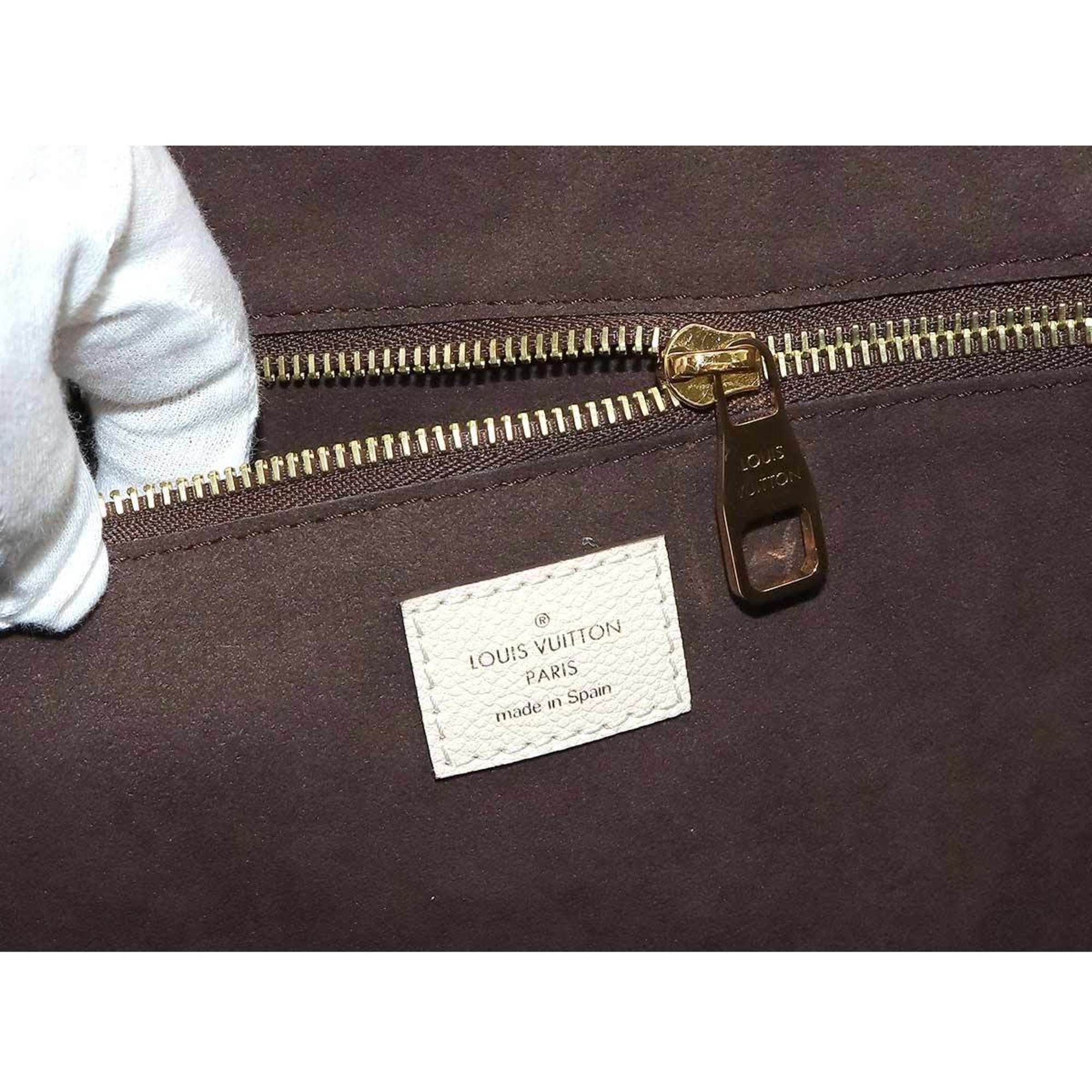 LOUIS VUITTON Monogram Empreinte Neverfull MM Leather Crème M45684 Ivory RFID