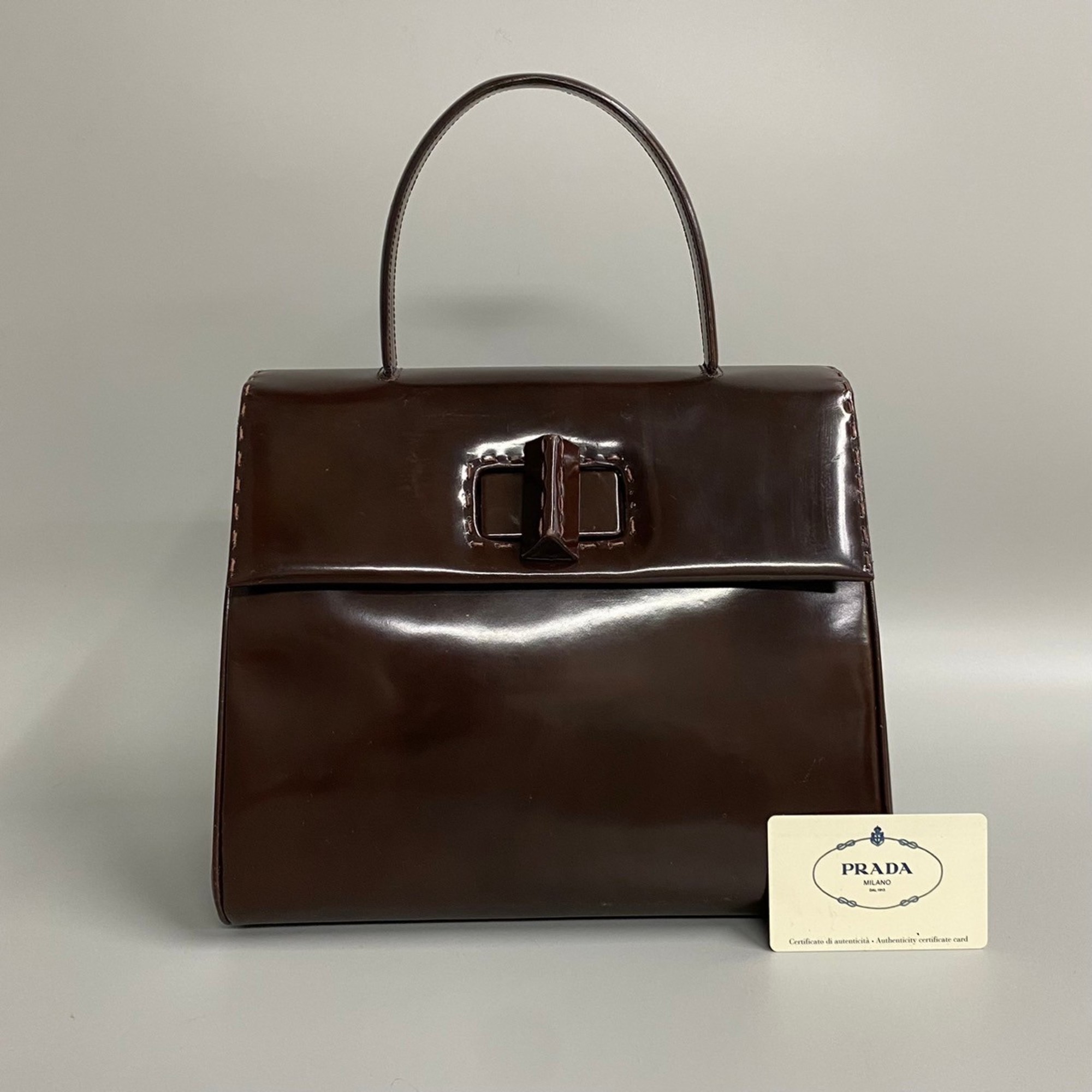 PRADA Prada turnlock hardware patent leather handbag tote bag brown 21372