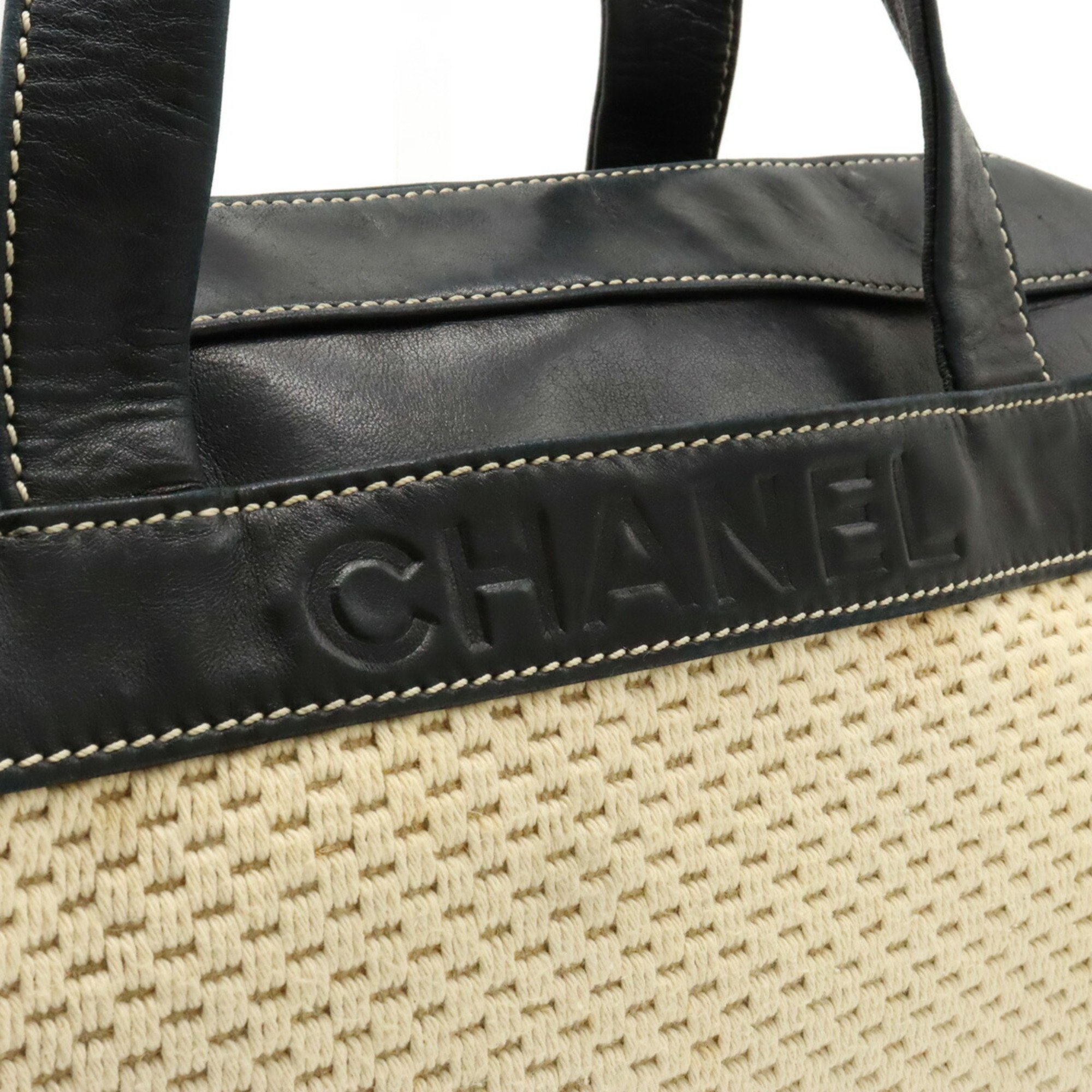 CHANEL Boston handbag in cotton, leather, natural and black