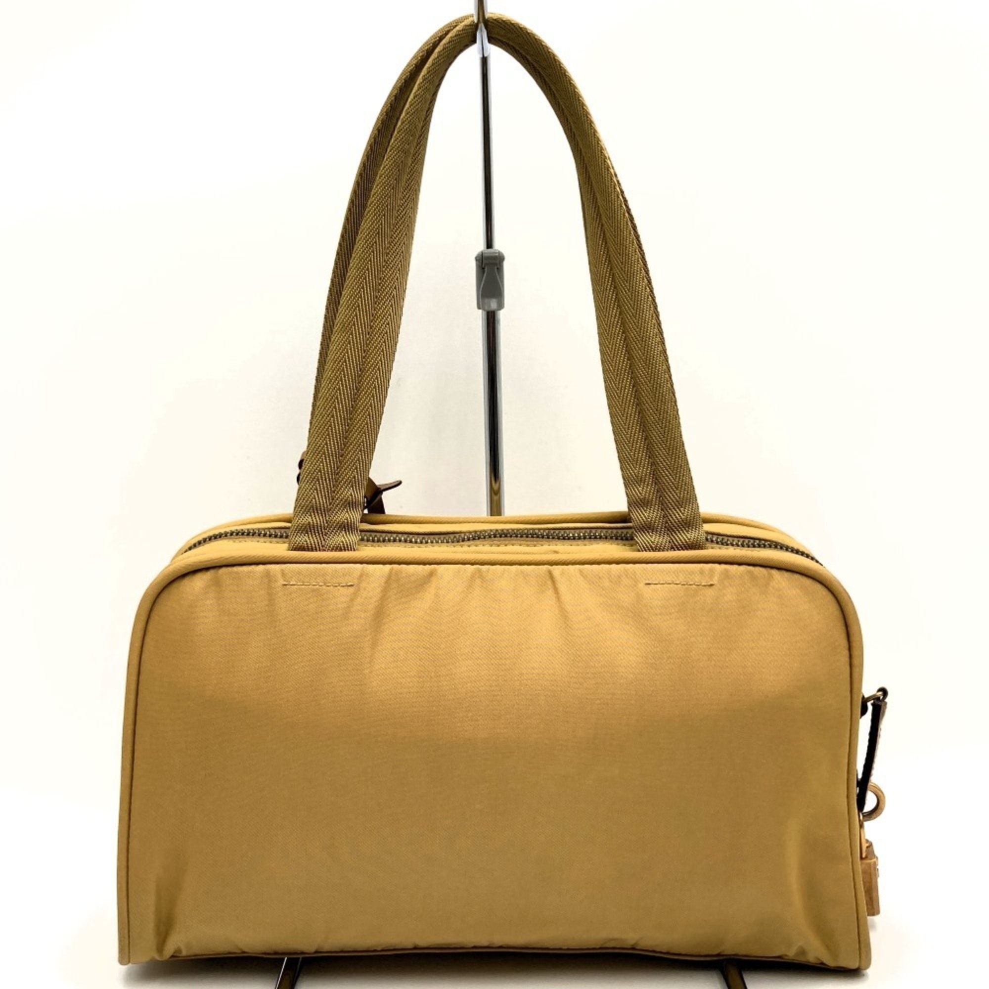 Prada handbag, crochet, yellow nylon, triangle, for women, PRADA