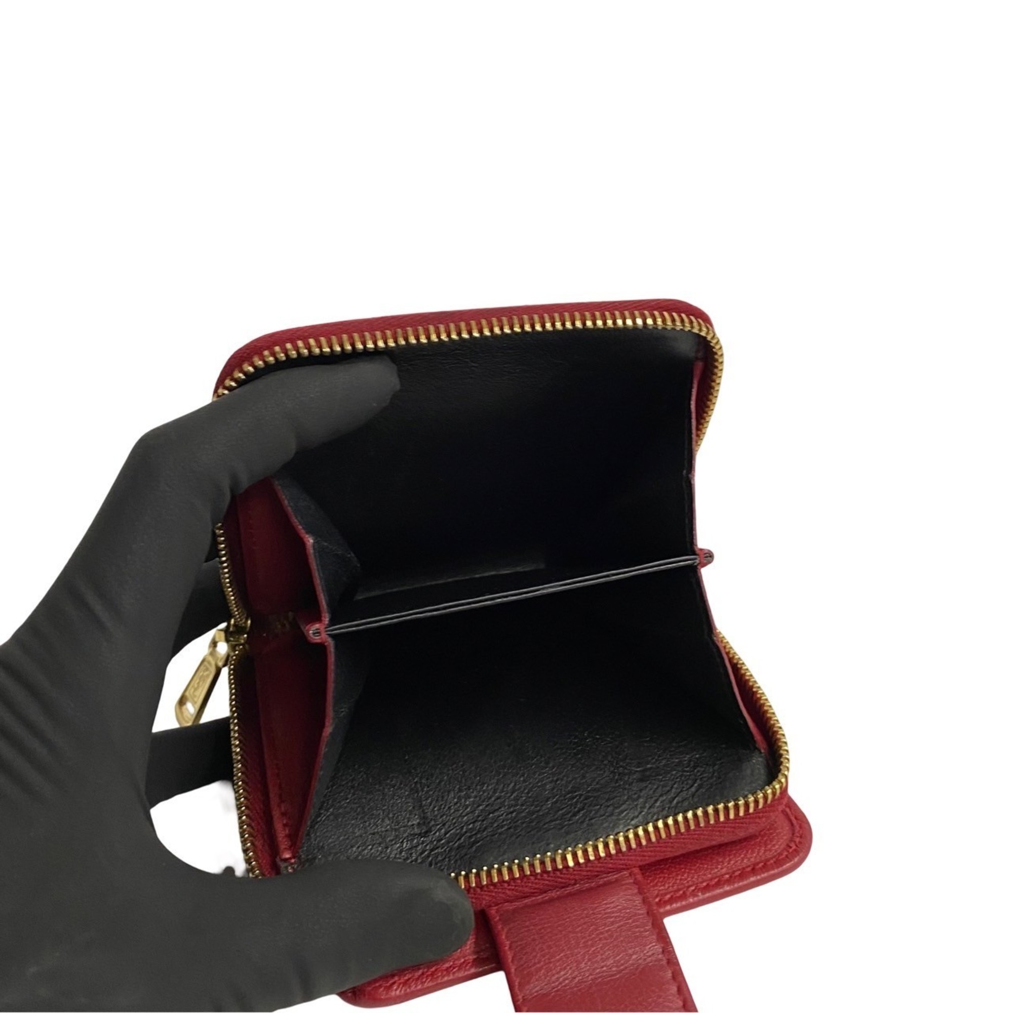YVES SAINT LAURENT YSL metal fittings leather round zip bi-fold wallet red 33636