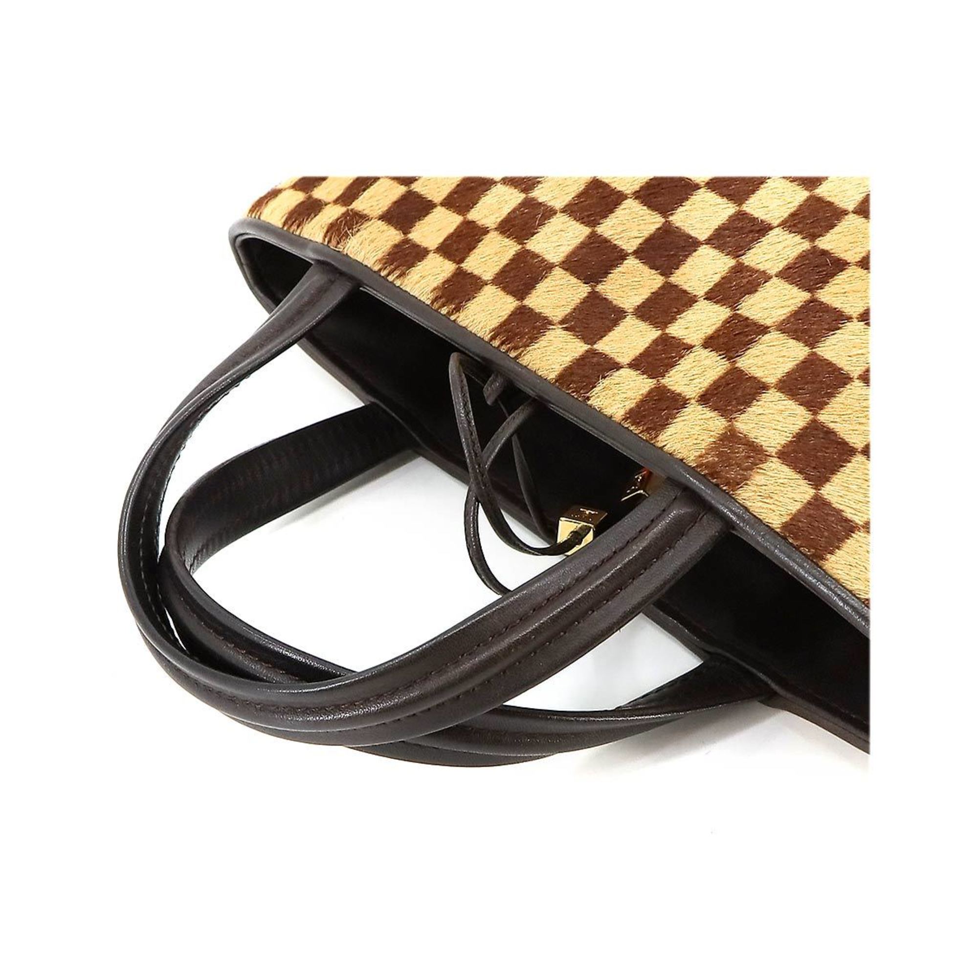 Louis Vuitton Damier Sauvage Impala hand bag in brown pony leather M92133