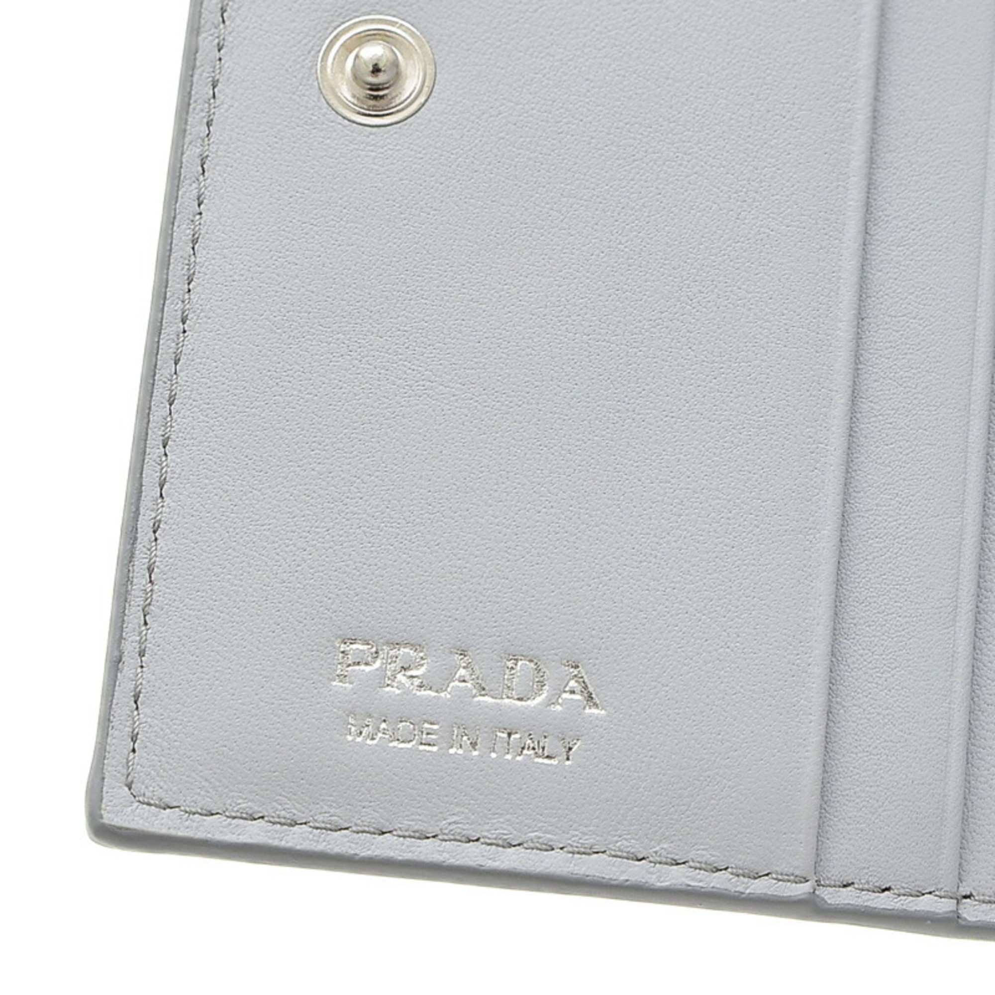 Prada Metal Vitello Dino Bi-fold Wallet Leather Light Blue 1ML050