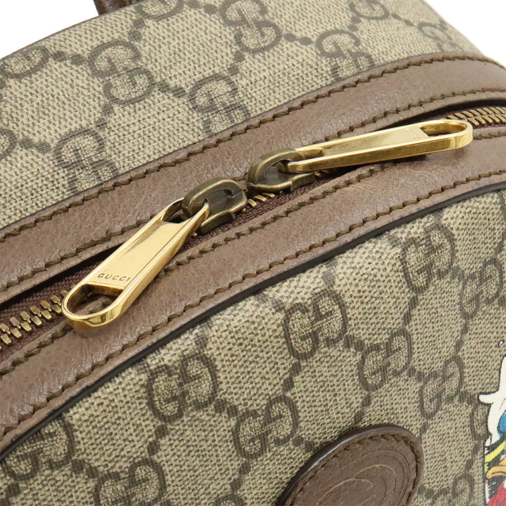 GUCCI GG Supreme Disney collaboration Donald Duck backpack PVC leather khaki beige brown 552884