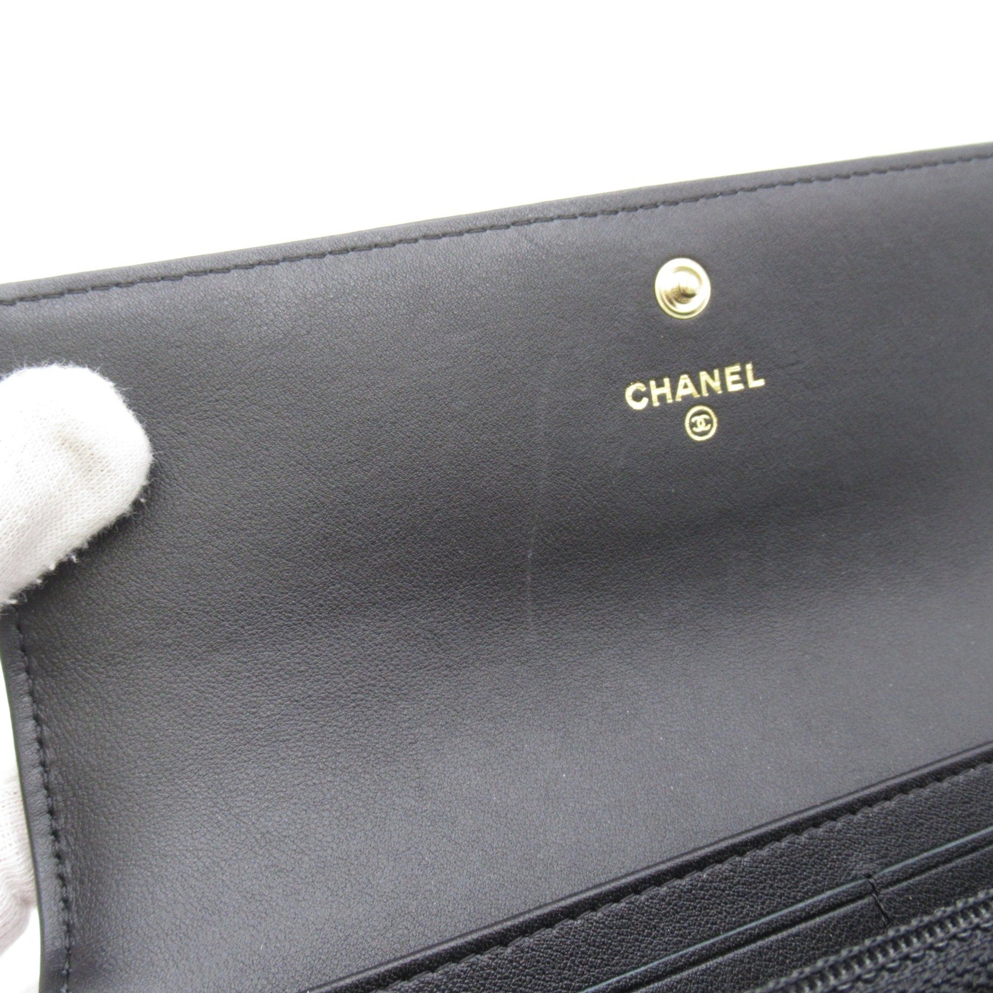 CHANEL Bifold long wallet Black Lambskin (sheep leather) Calfskin (cowhide)