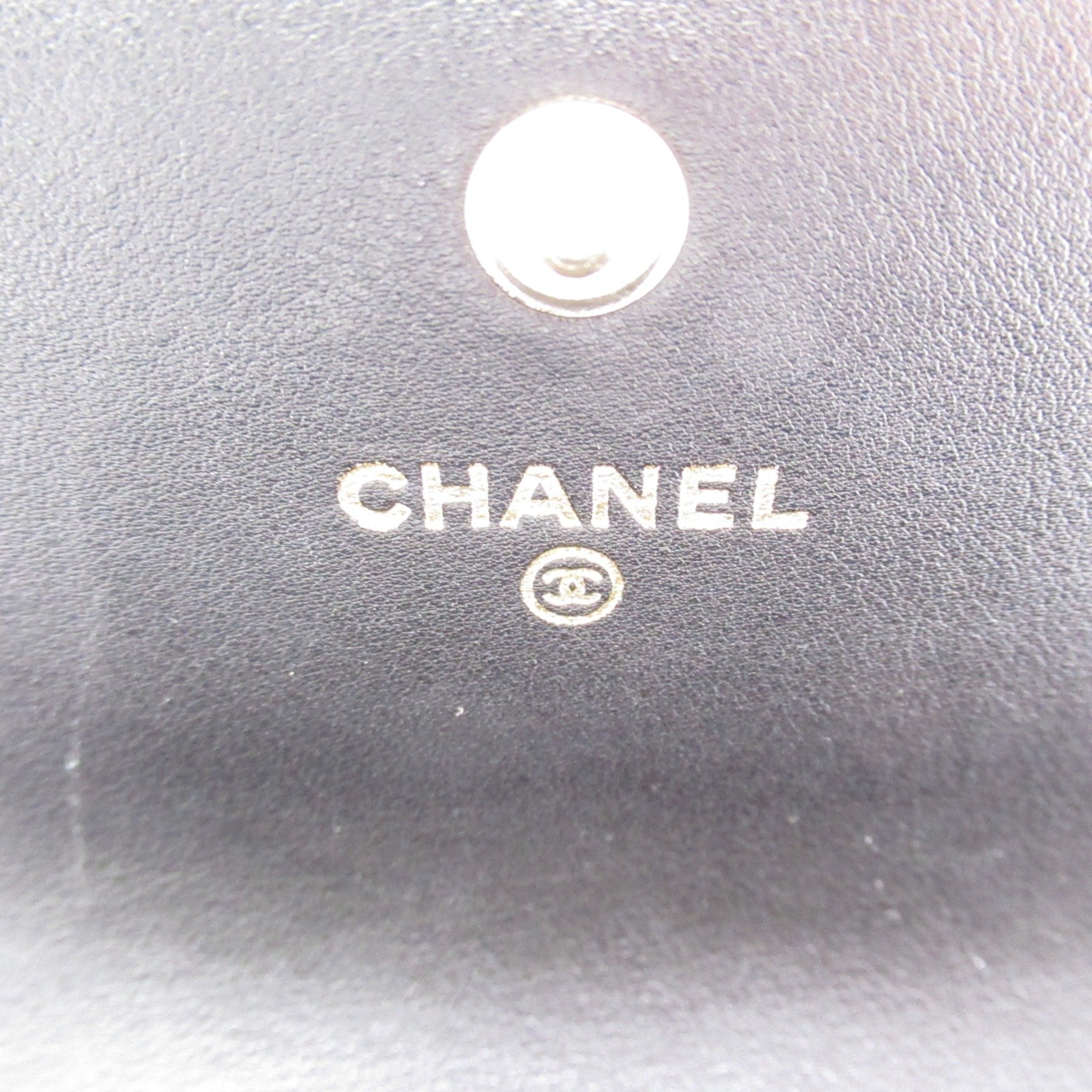 CHANEL Bifold long wallet Black Lambskin (sheep leather) Calfskin (cowhide)