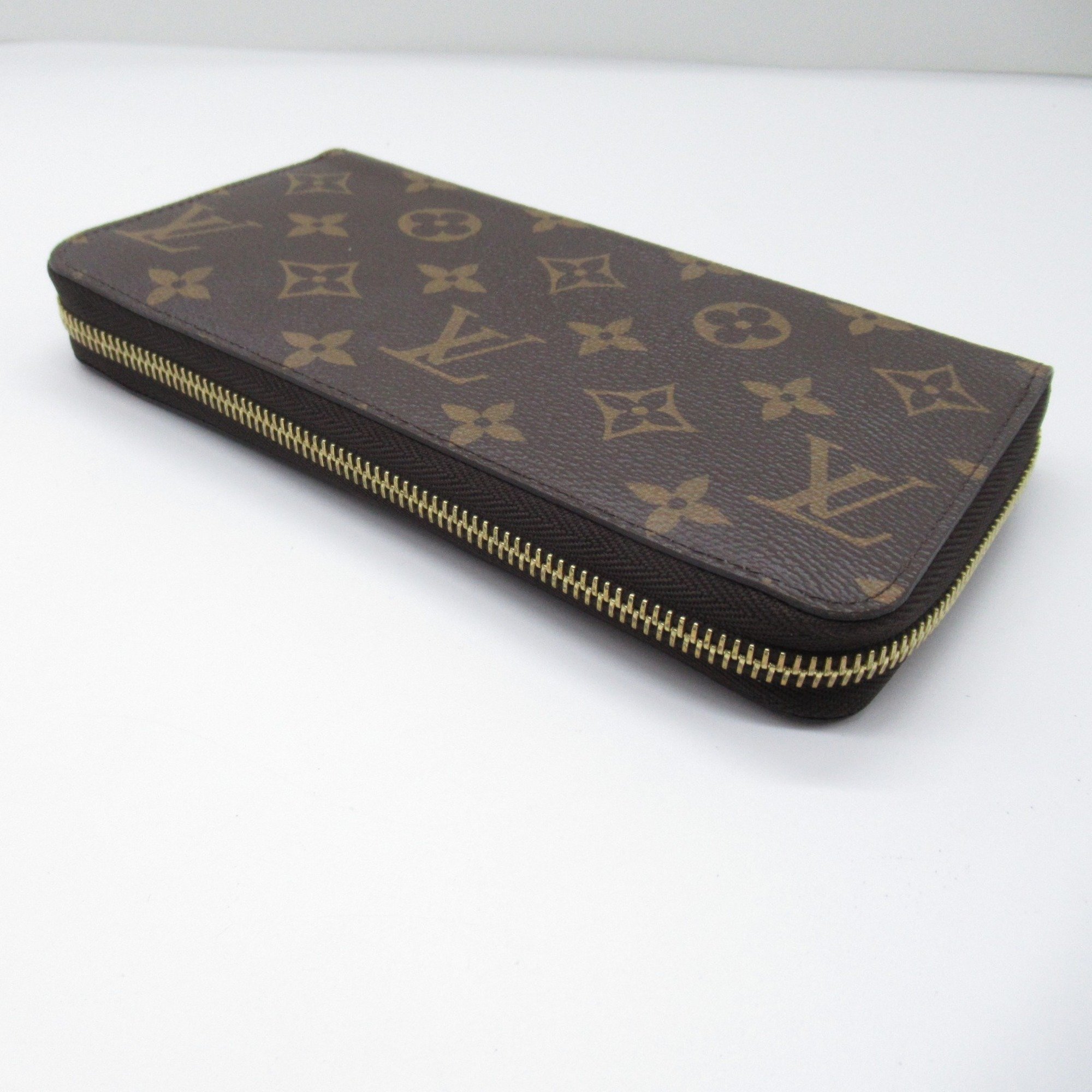 LOUIS VUITTON Zippy wallet Brown Fuschia Monogram PVC coated canvas M41895