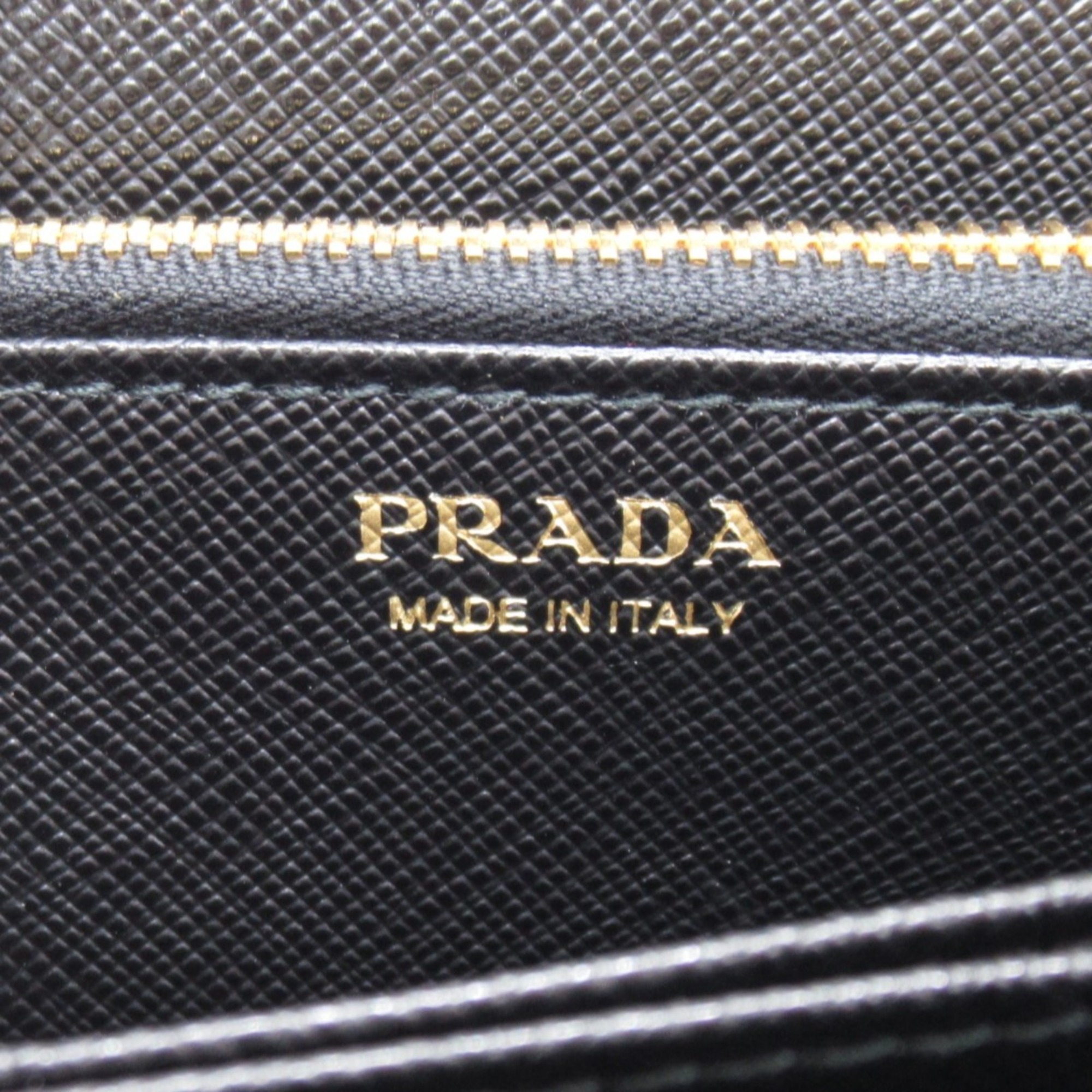 PRADA Round long wallet Black Safiano leather 1ML506