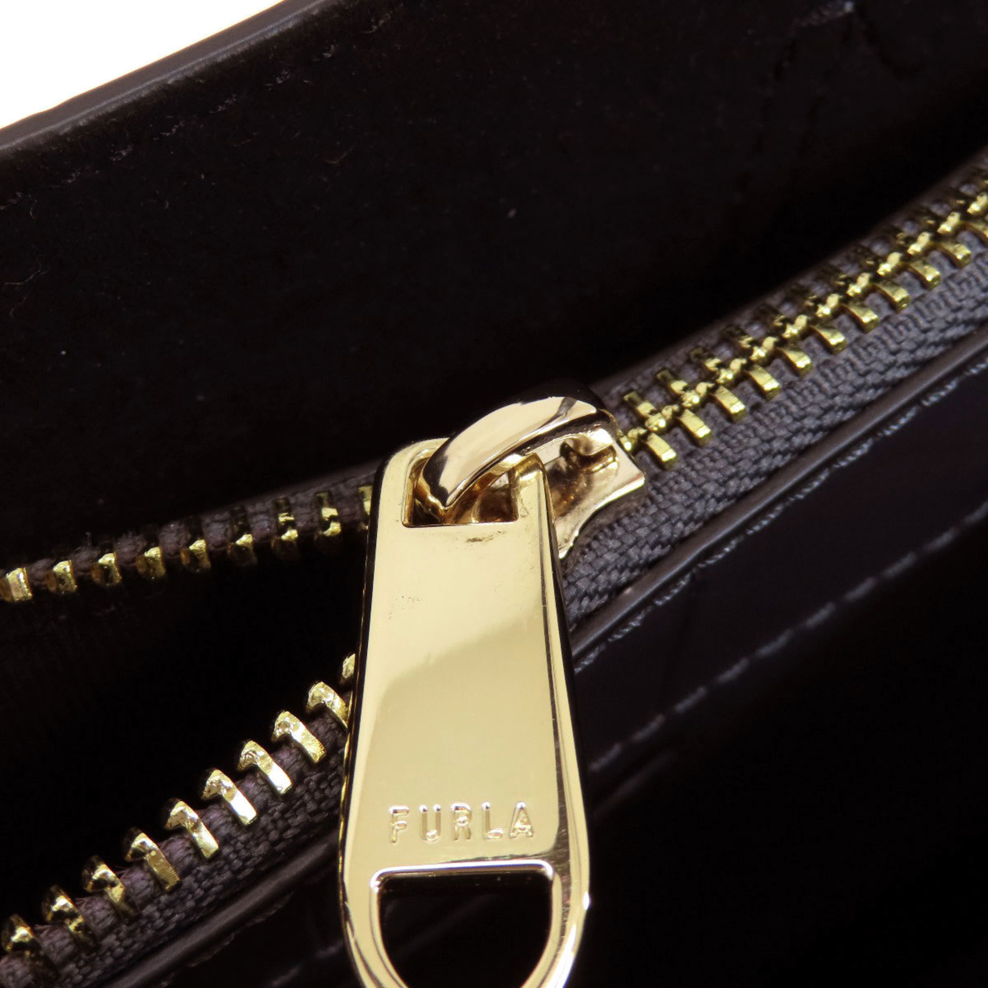 Furla embossed leather handbag for women