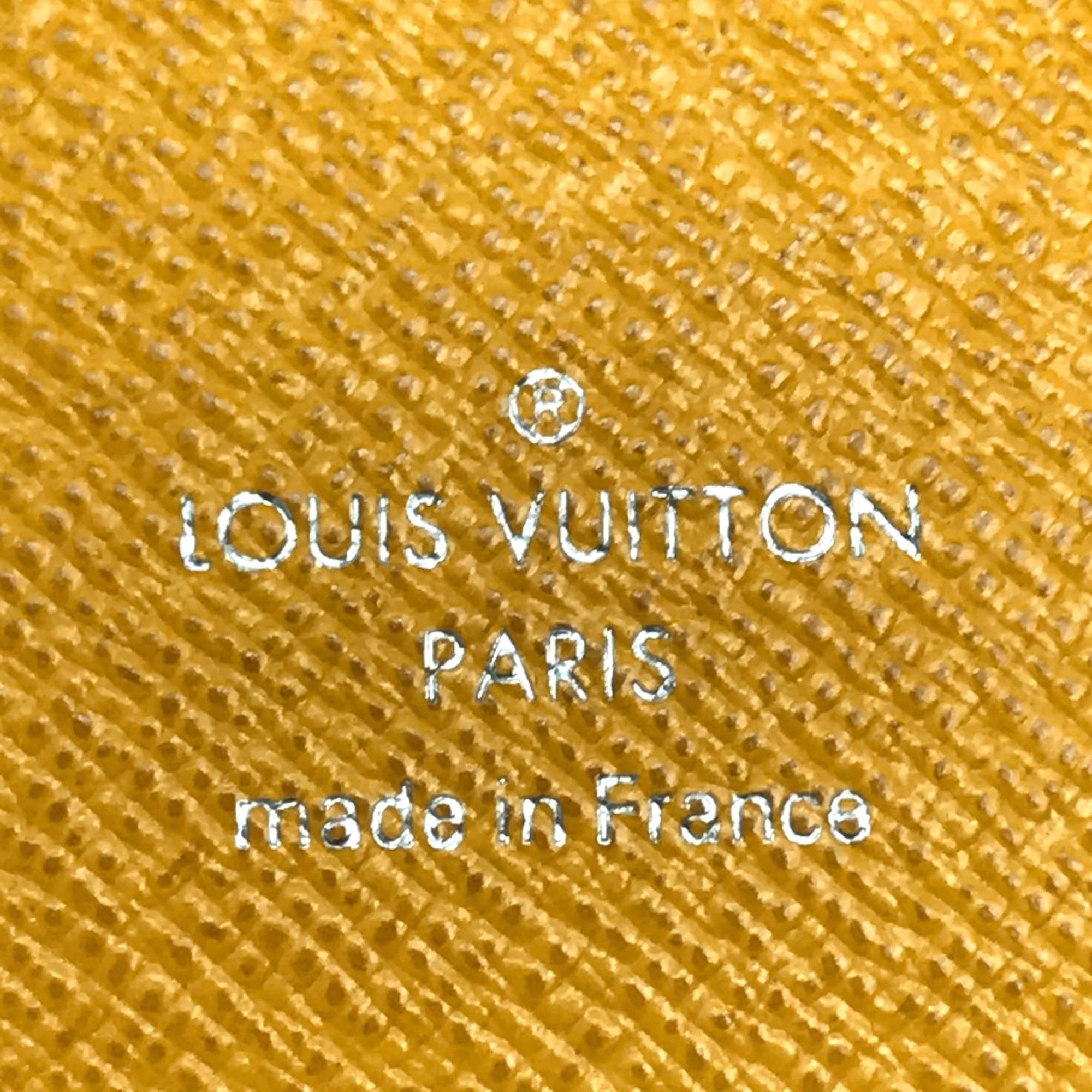 Louis Vuitton M42087 Taiga Long Wallet Jaune yellow