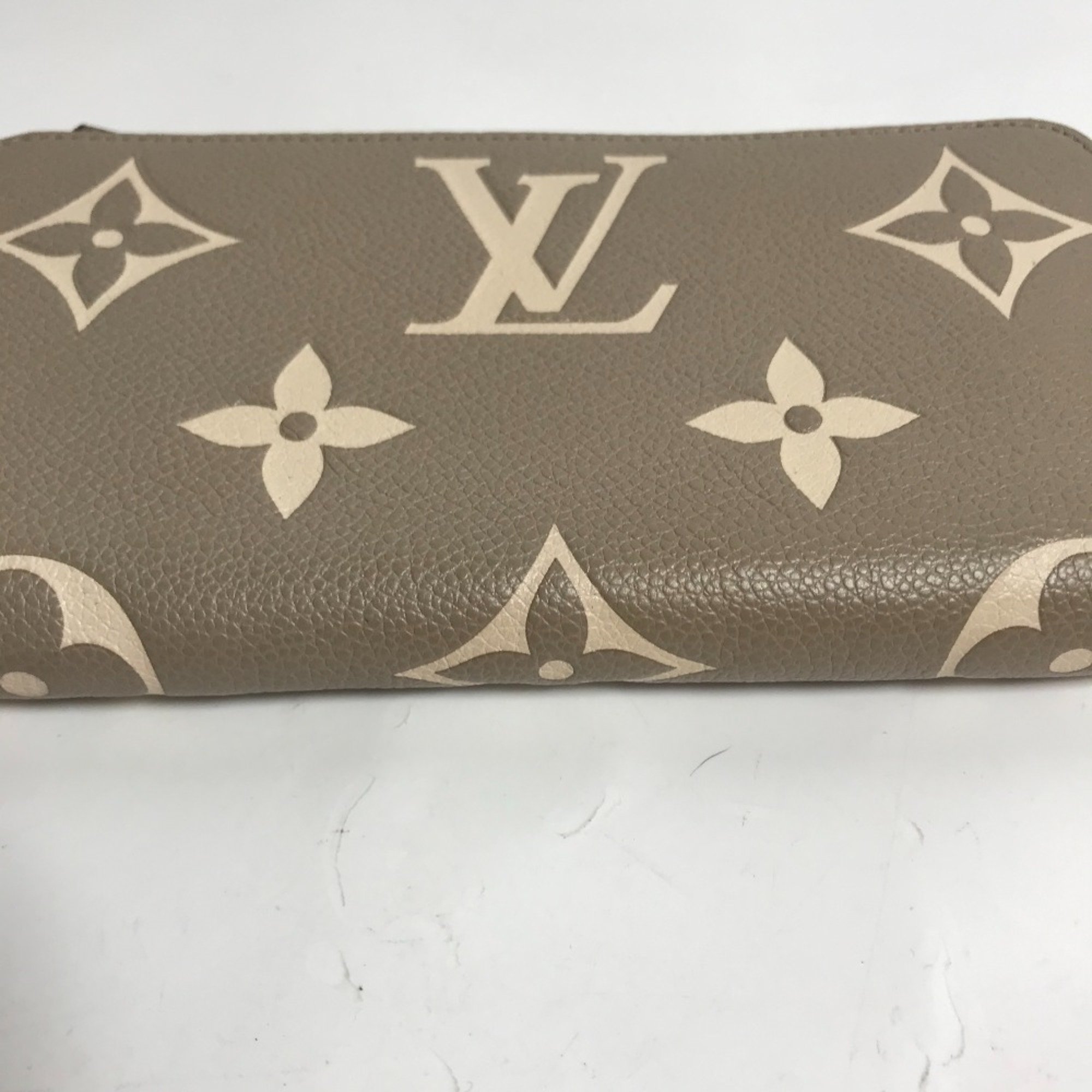 Louis Vuitton M69794 MonogramEmpreinte Zip Around Long Wallet Turtrail claims Beige