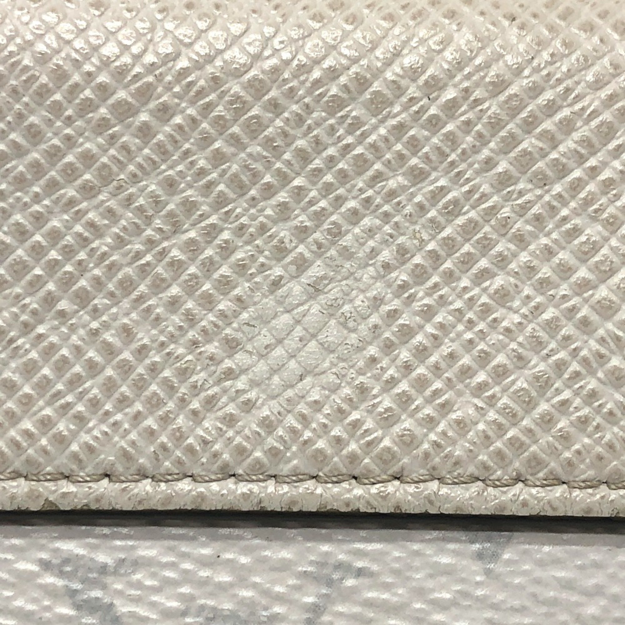 Louis Vuitton M67621 Taigarama Monogram Trifold wallet White