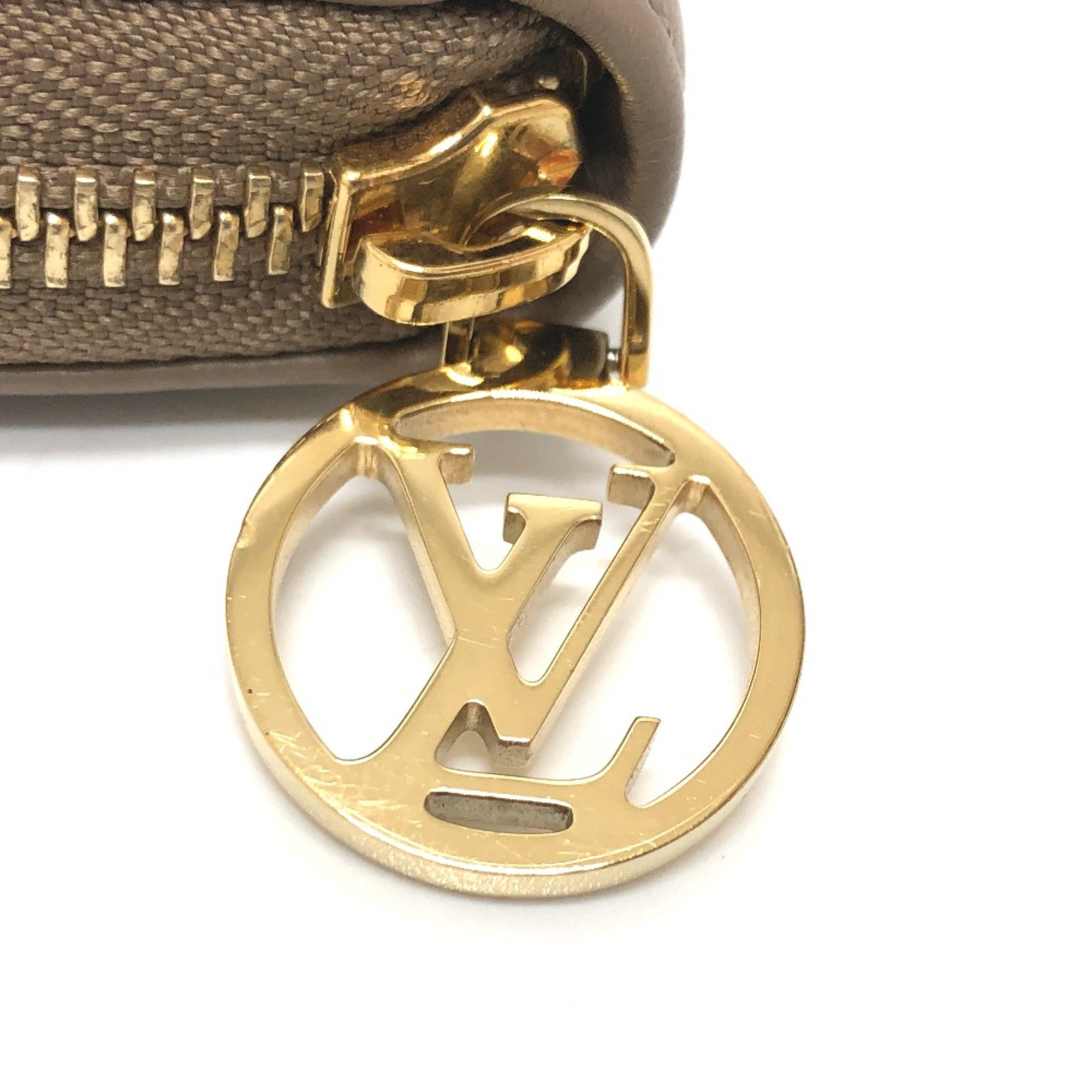 Louis Vuitton M81511 Monogram emboss Zip Around Long Wallet BeigeBased GoldHardware