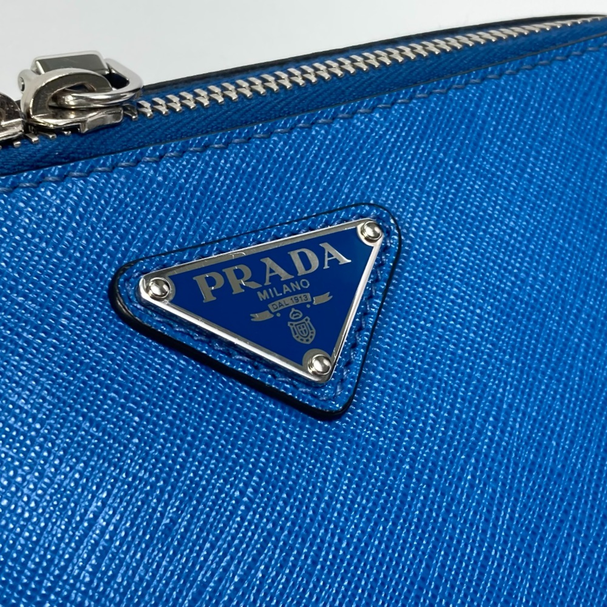 PRADA triangle logo triangle logo plate Bag Backpack blue