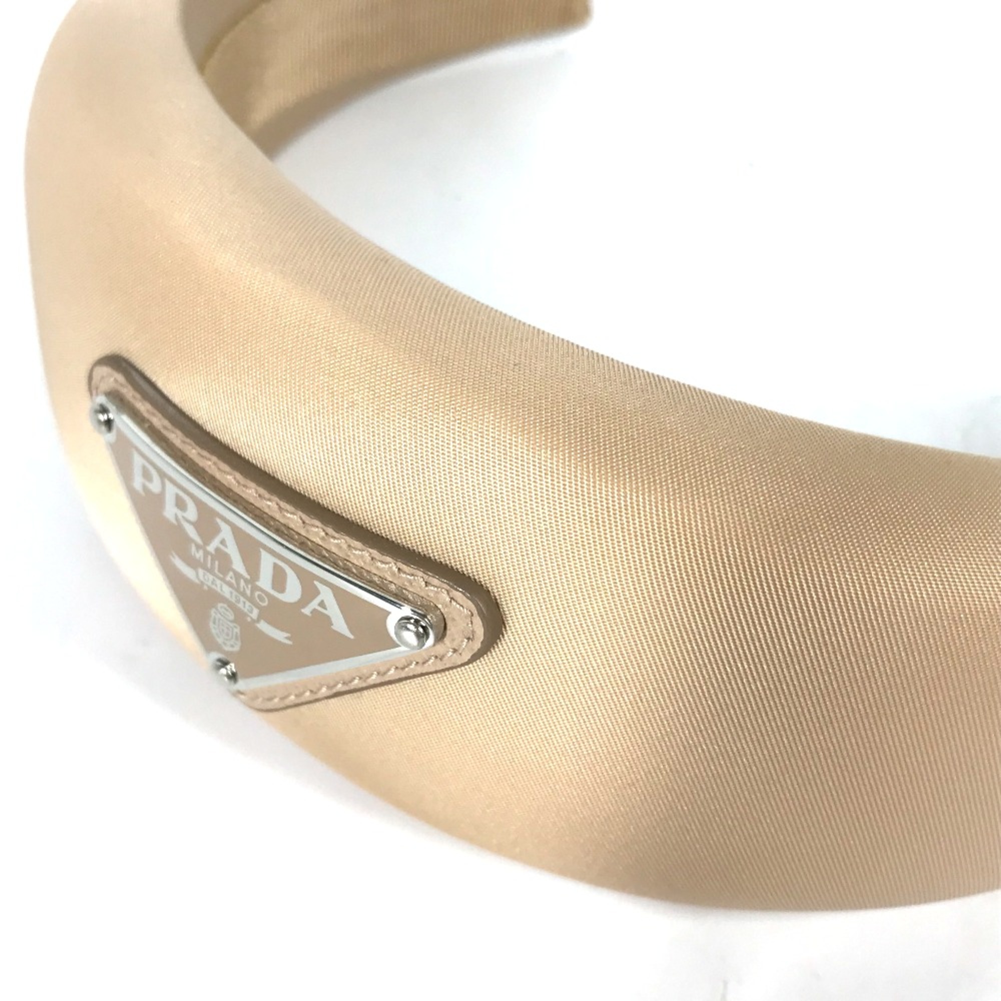 PRADA 1IH016 triangle logo triangle logo plate Hair band head band Katyusha Beige