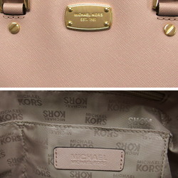 Michael Kors embossed leather handbag in light pink