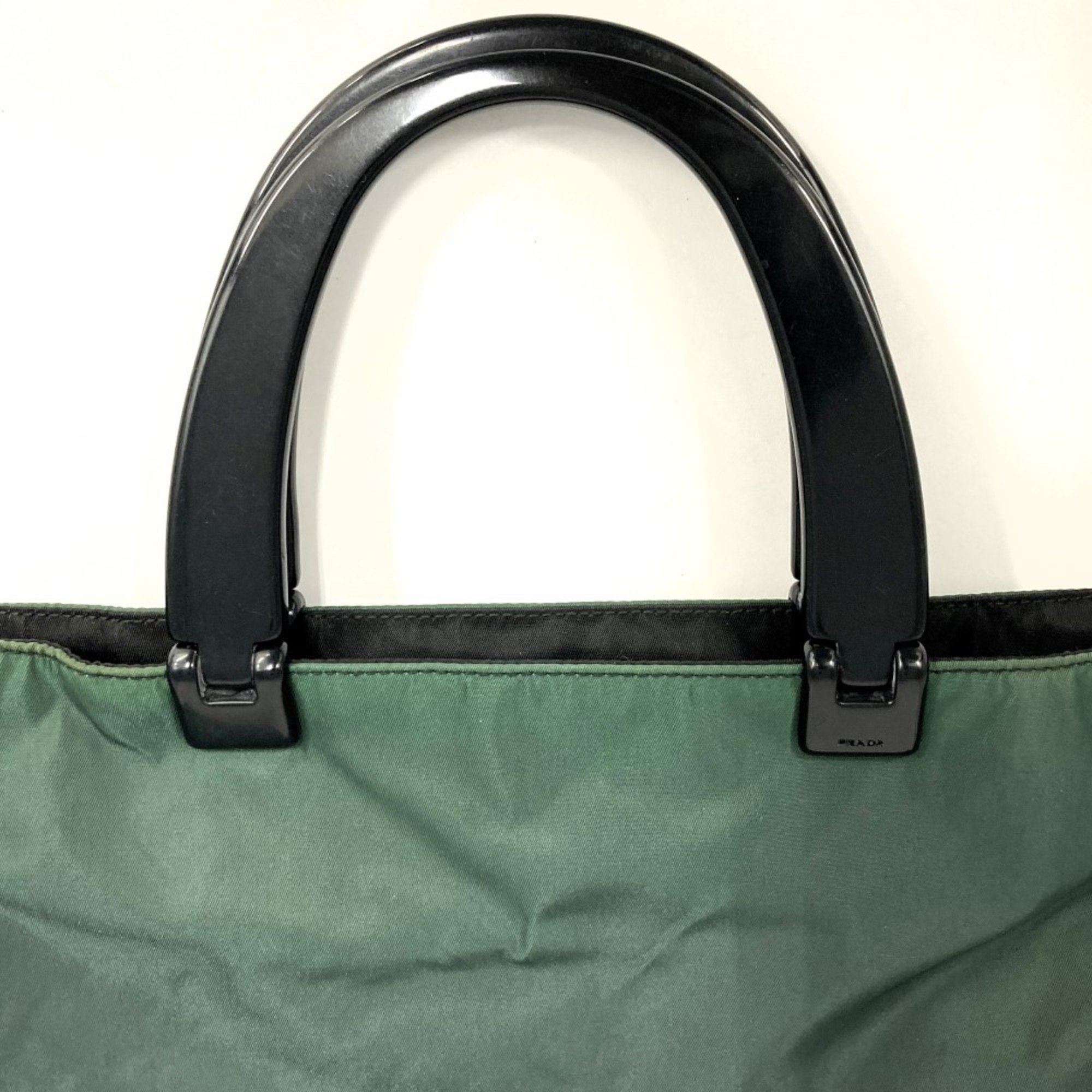 PRADA Prada handbag, triangular, nylon, plastic handle, white tag, green x black, green, women's