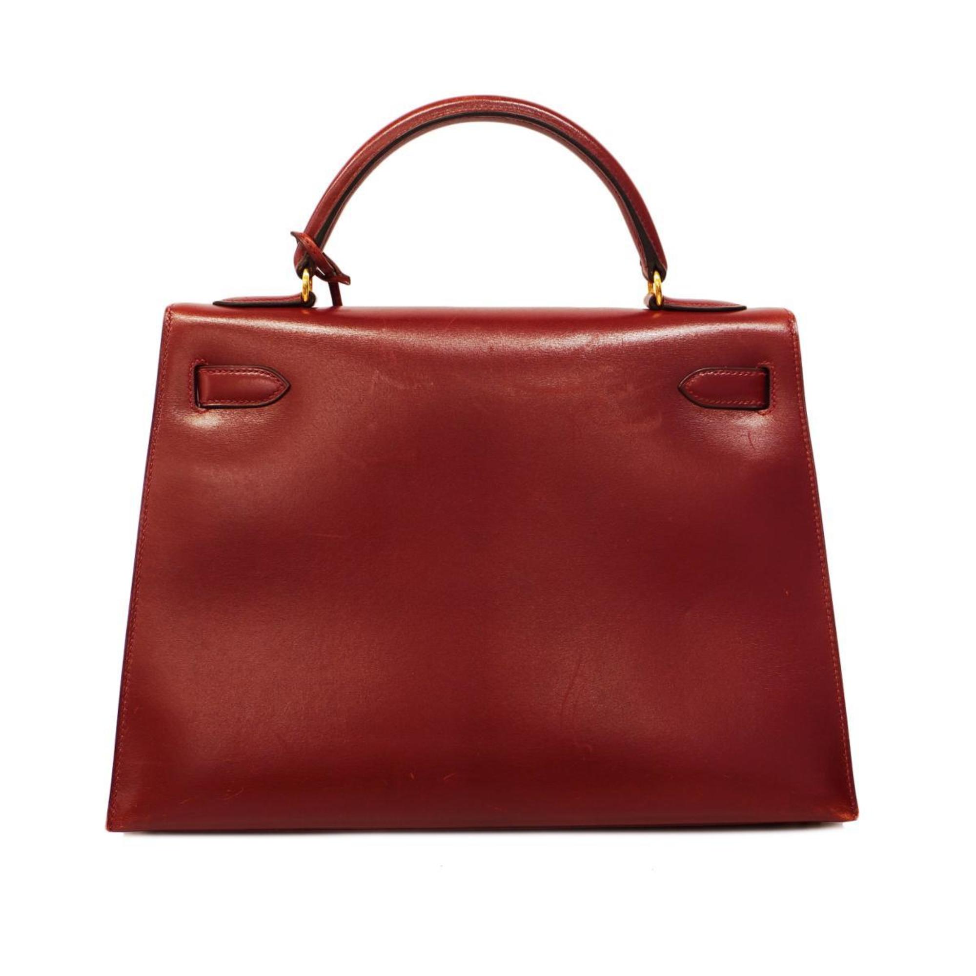 Hermes handbag Kelly 32 A stamp box calf Rouge H ladies