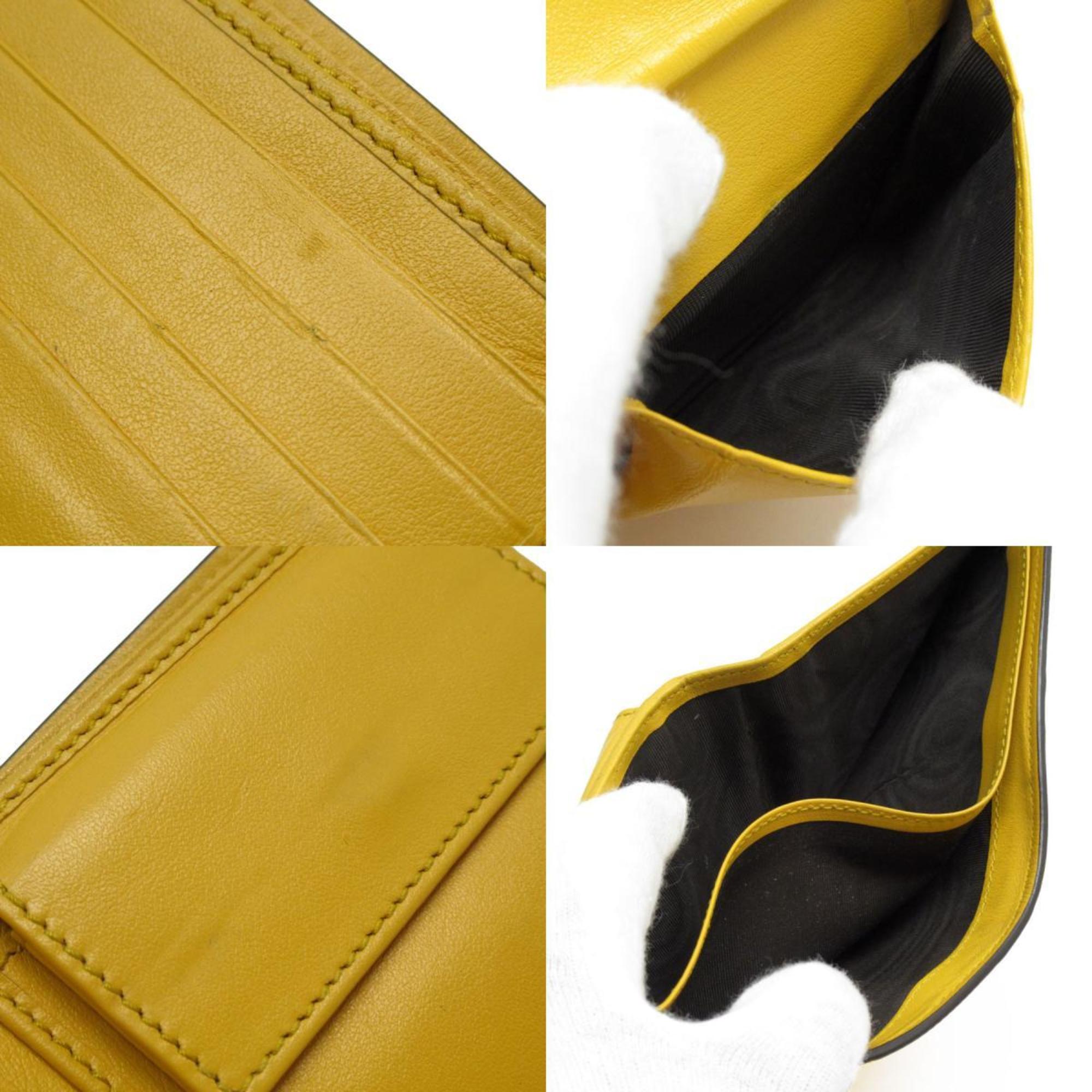 GUCCI Bi-fold wallet GG embossed leather yellow men's 625555 w0725j