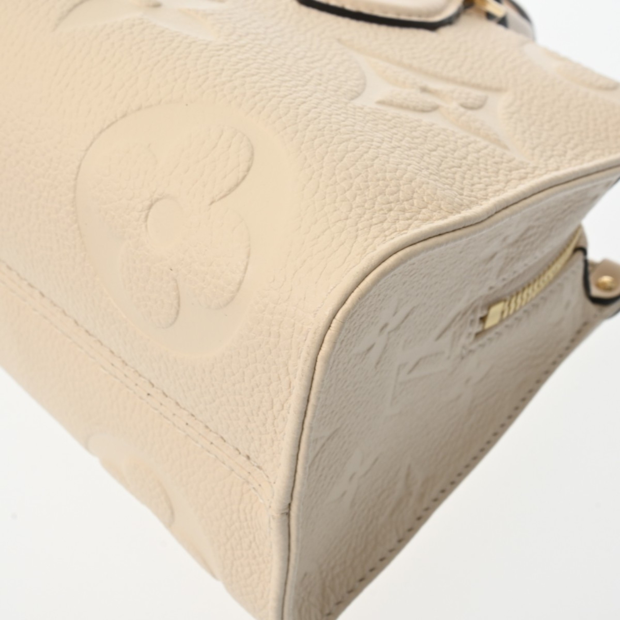 LOUIS VUITTON Louis Vuitton Monogram Empreinte On the Go EW Creme M23698 Women's Leather Handbag