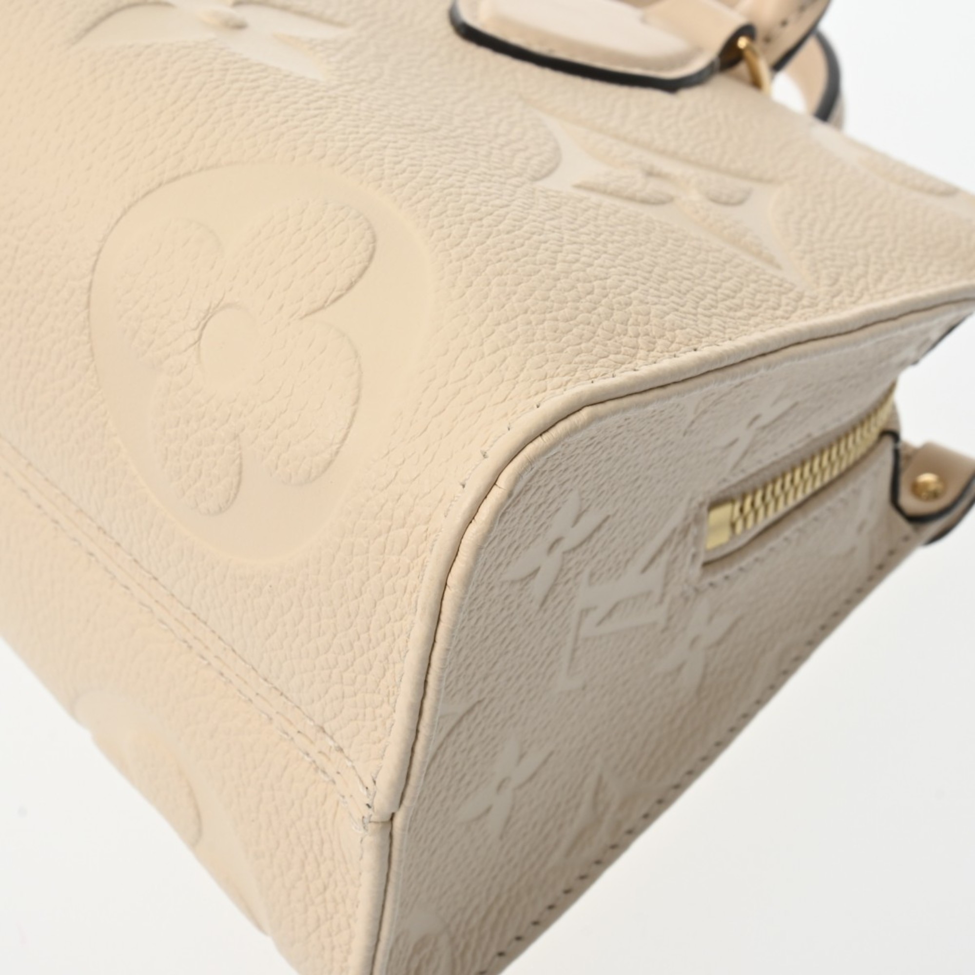 LOUIS VUITTON Louis Vuitton Monogram Empreinte On the Go EW Creme M23698 Women's Leather Handbag