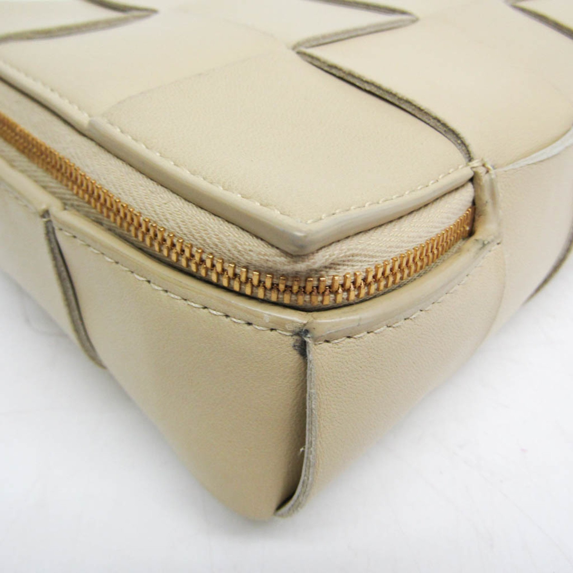 Bottega Veneta Intrecciato Cassette Men,Women Leather Clutch Bag Light Beige