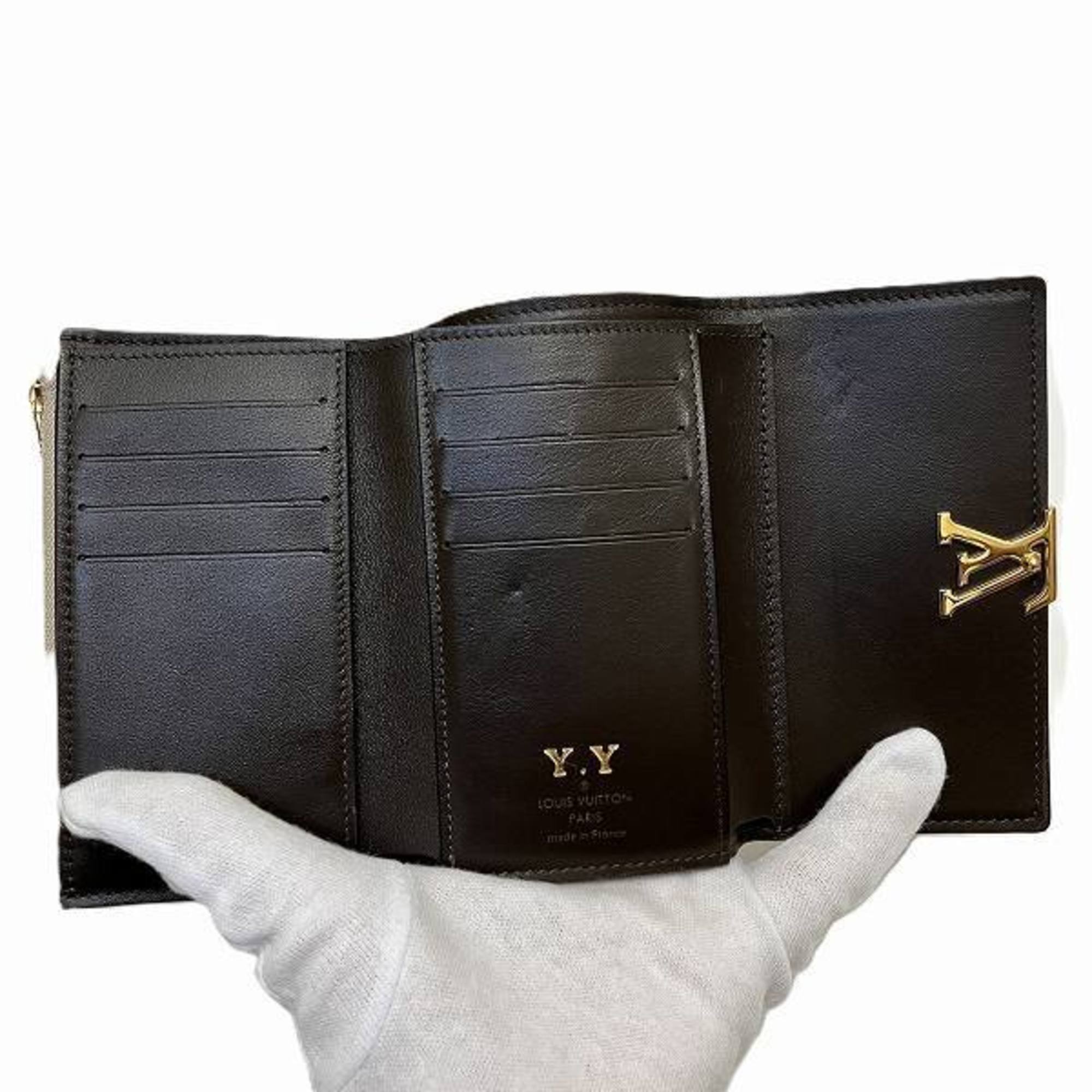 Louis Vuitton Capucines Portefeuille. XS M68747 Tri-fold Wallet for Women