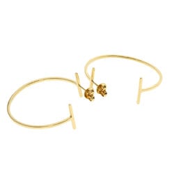 Tiffany & Co. T-wire hoop large earrings in 18k yellow gold for women. TIFFANY