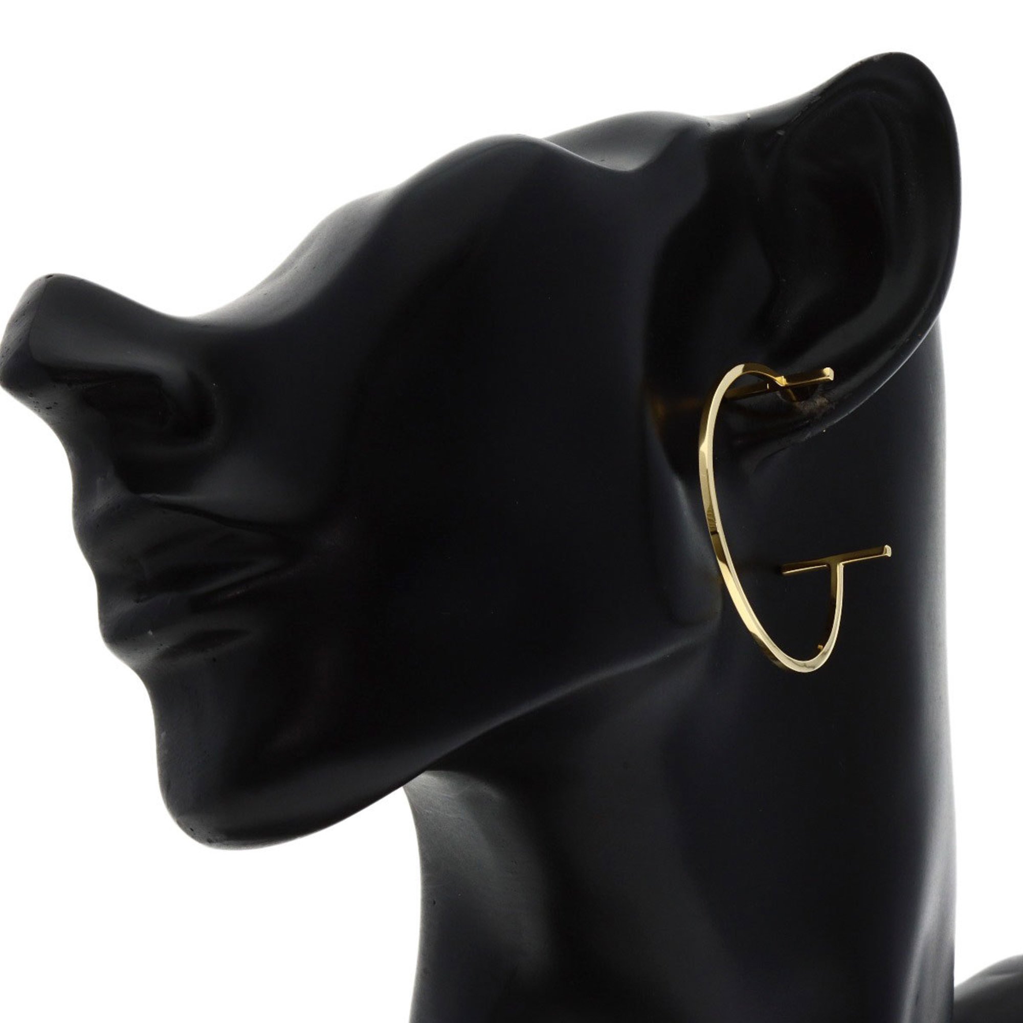 Tiffany & Co. T-wire hoop large earrings in 18k yellow gold for women. TIFFANY