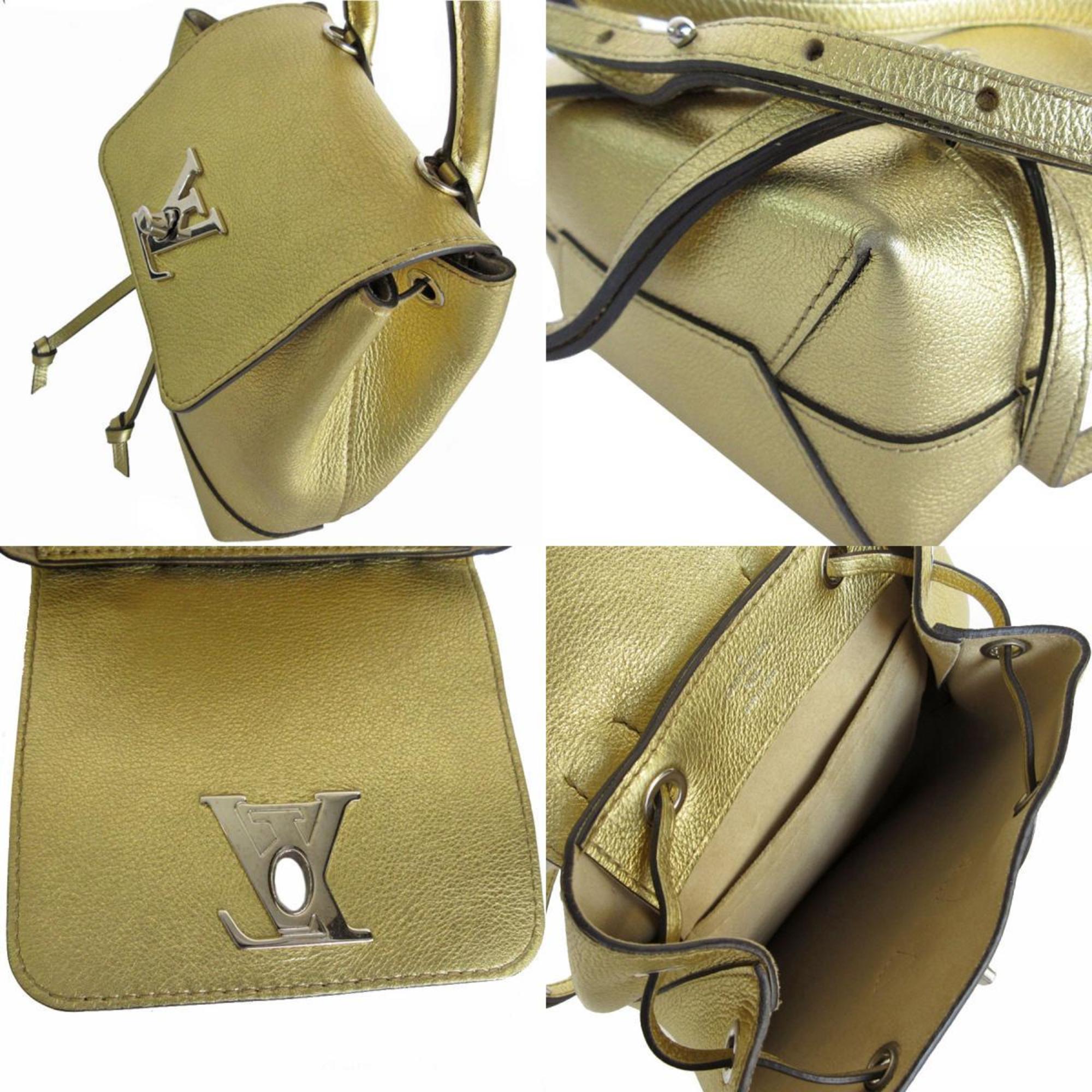 Louis Vuitton LOUIS VUITTON Backpack Lock Me Leather Gold Silver Women's M54575 s0141a